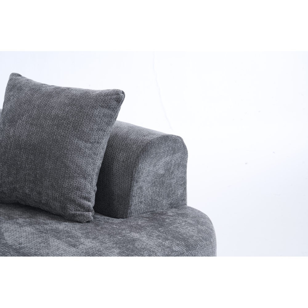 Crescent-shaped sofa, modern low-back design with deep cushions, self-inflating