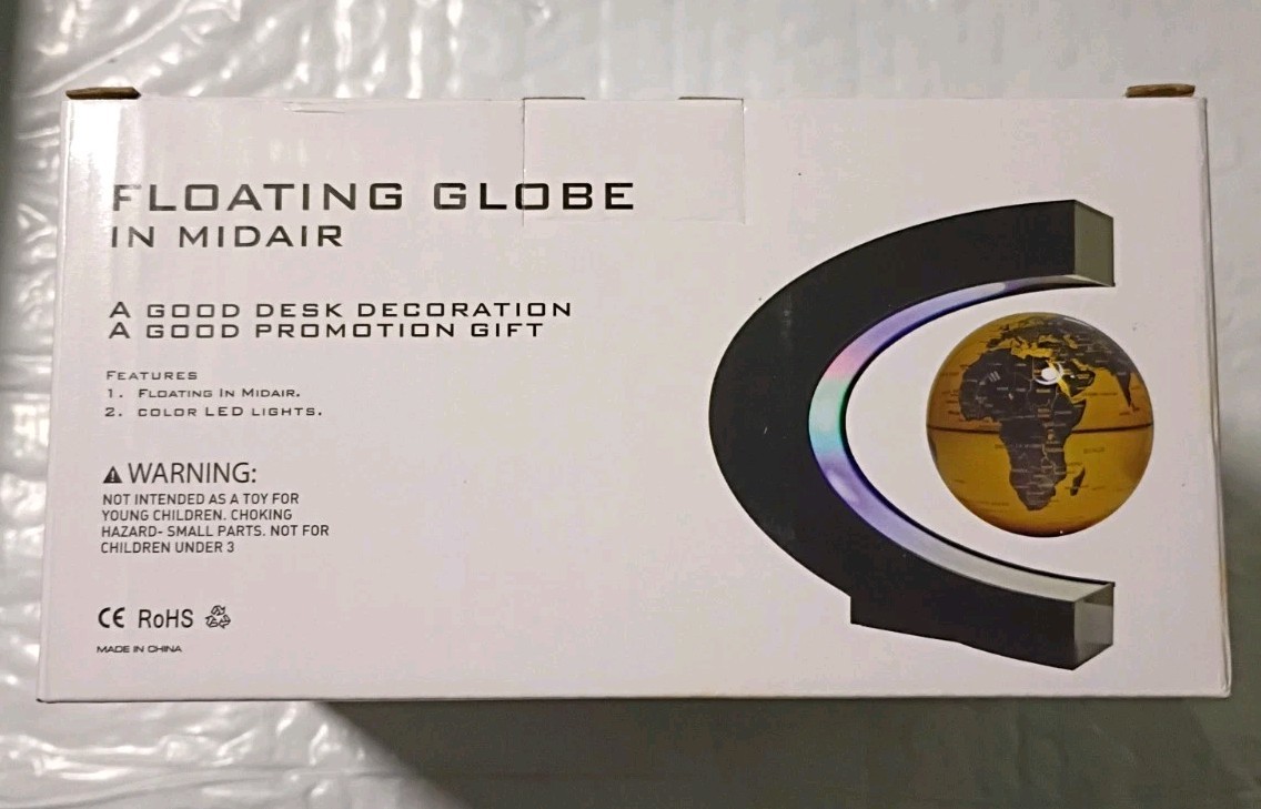 GLOBE FLOATING AND ROTATING IN MIDAIR IN C SHAPED LEVITATION | BLACK - GOLD
