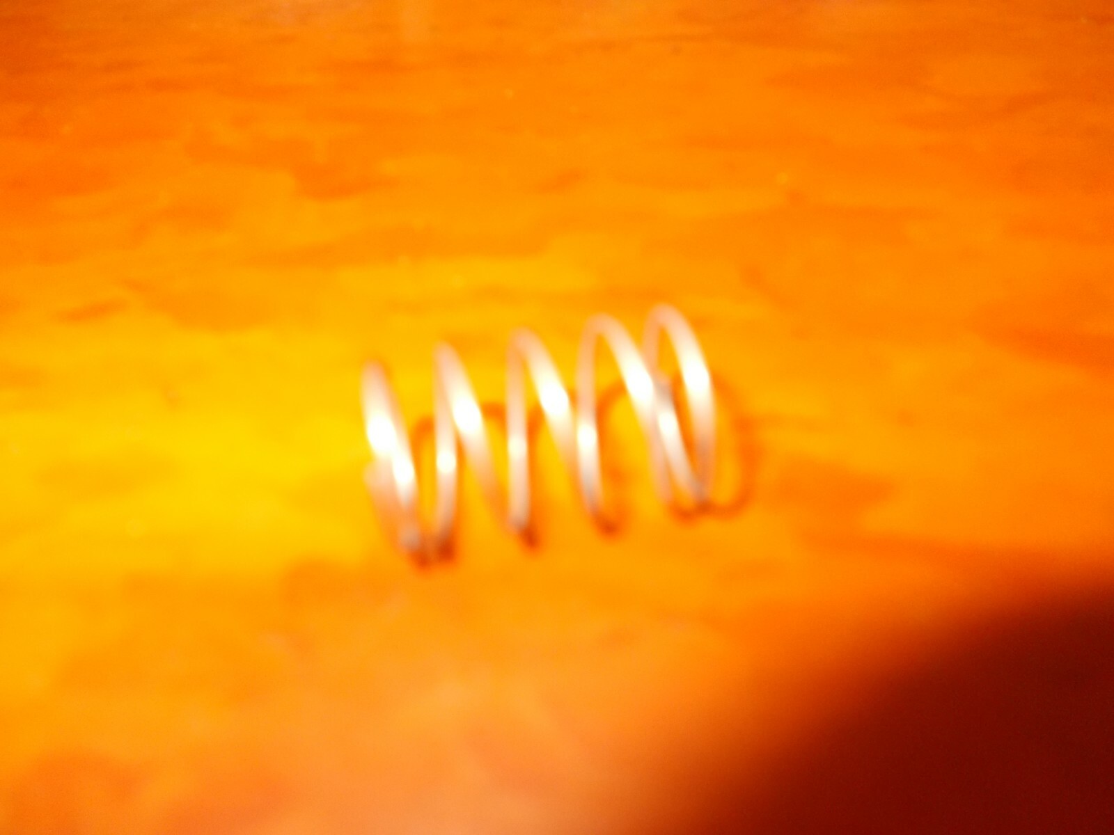 Paslode Part # 906336 SPRING, BUTTON (XP)