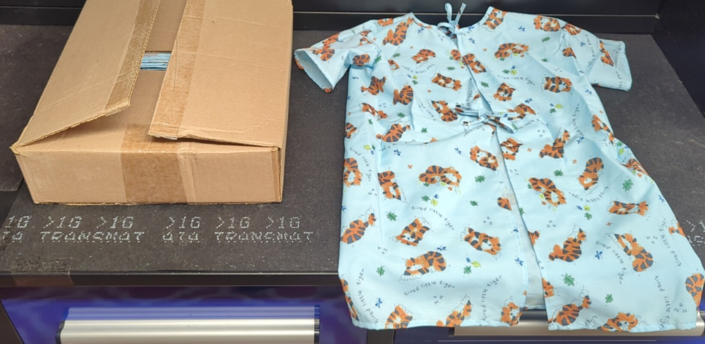 (1) Case Medline Pediatric Tired Tiger Print Pediatric large Blue Gown 24 Gowns