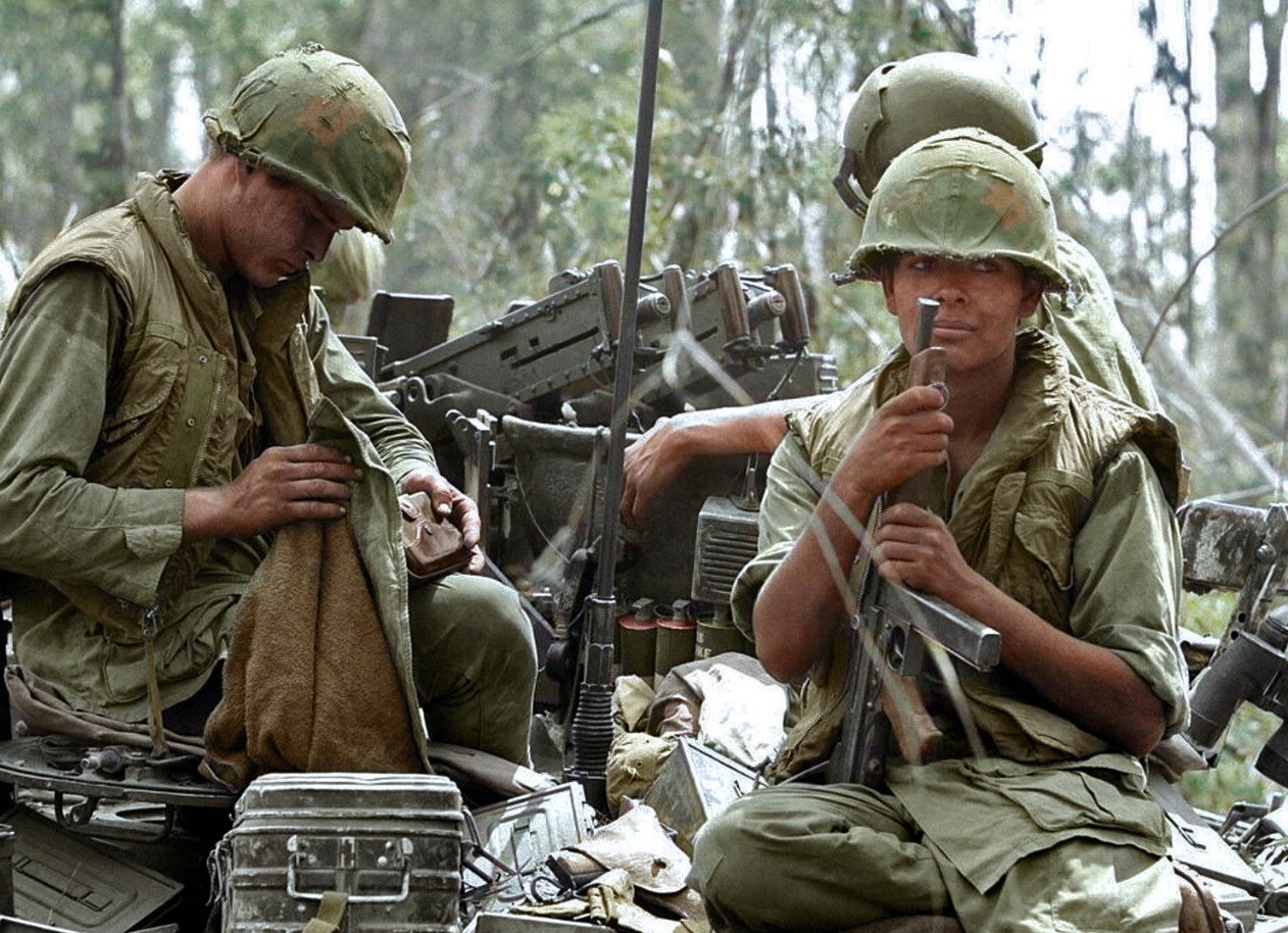 Vietnam  War  Photos --  Soldiers Cleaning Weapons