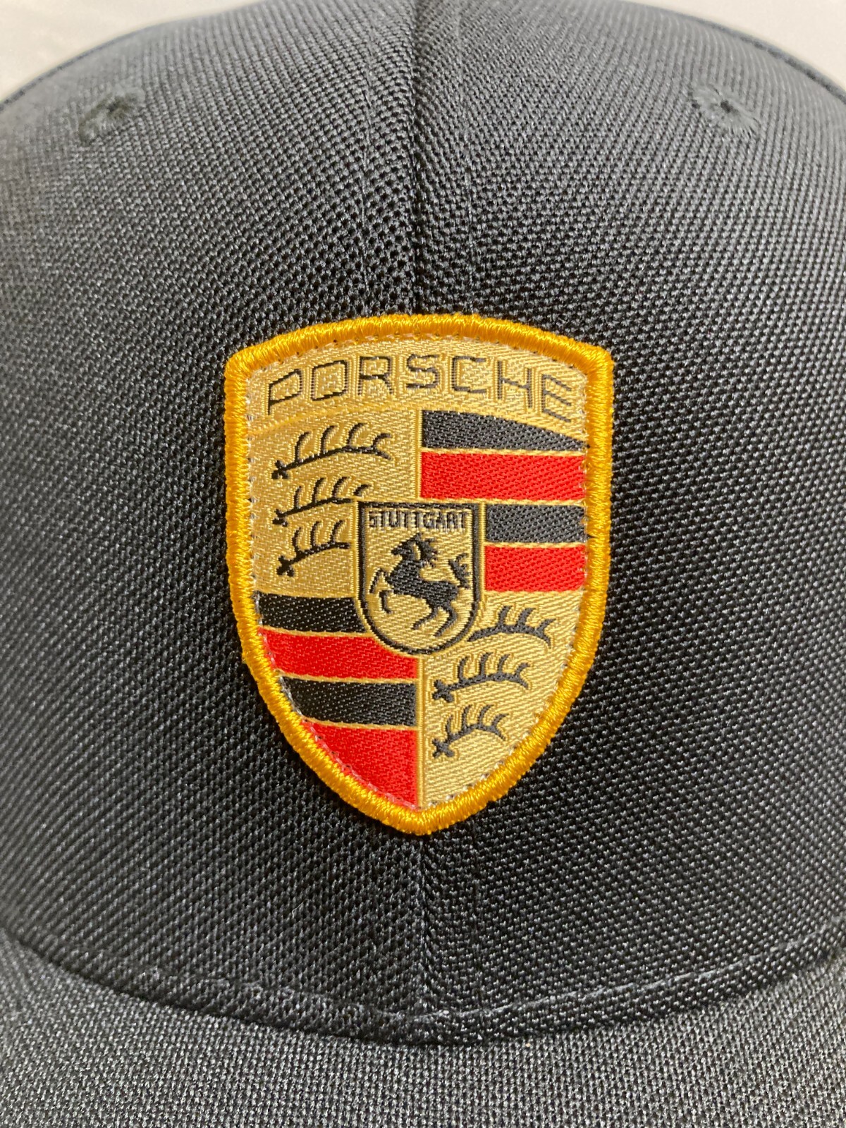PORSCHE DESIGN DRIVER'S SELECTION FLEX FIT CLASSIC COLOR CRESTED BLACK HAT. NIB.