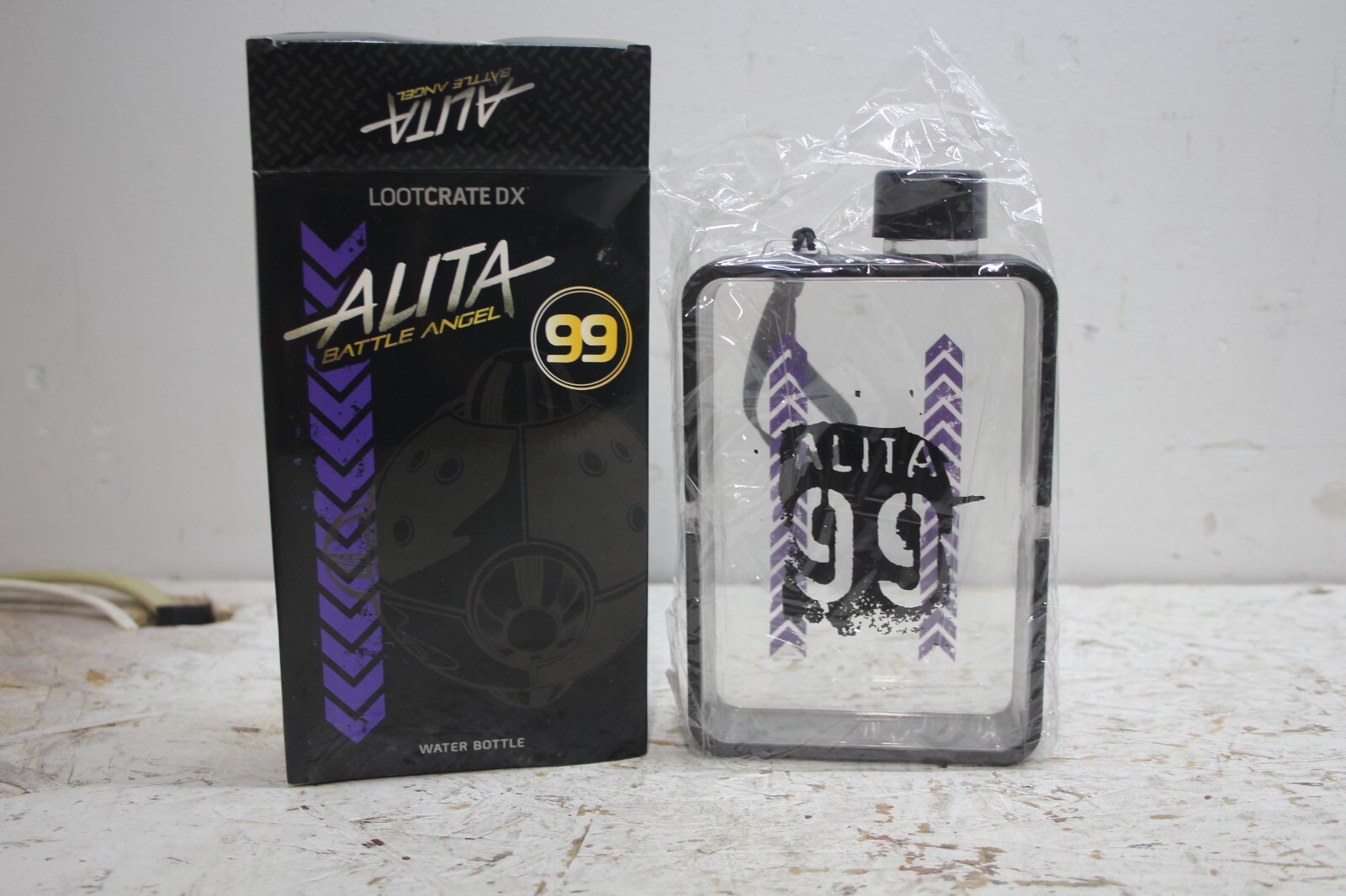 Loot Crate Alita Battle Angel 99 Water Bottle, rectangle with strap