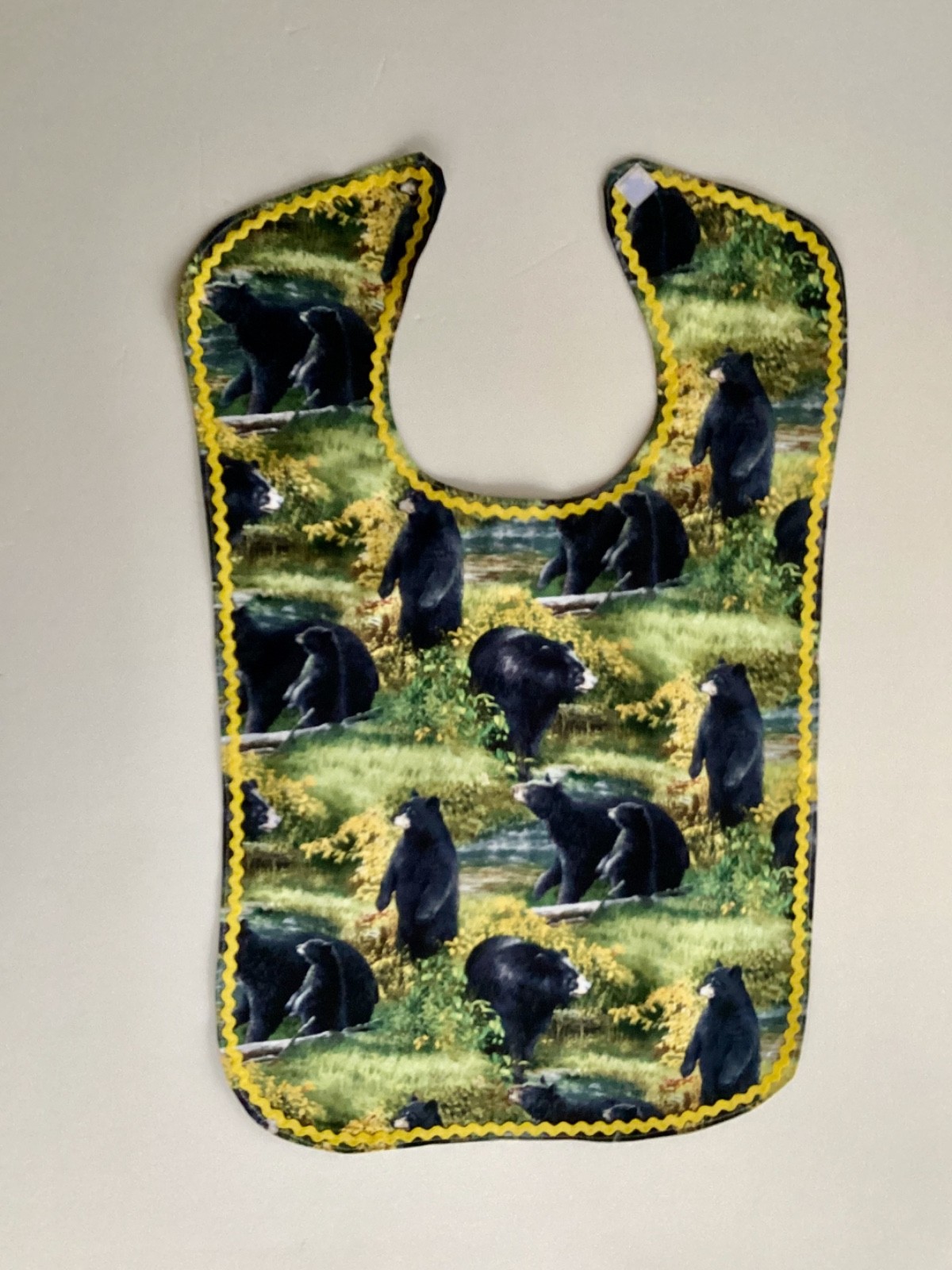 ADULT CLOTHING PROTECTOR/ BIB (BLACK BEARS IN THE MEADOW)