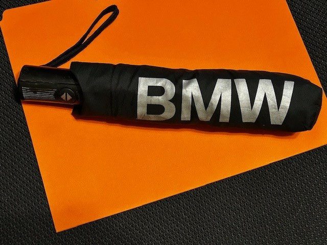 USED Black BMW compact umbrella with sleeve Opens and Closes Nicely