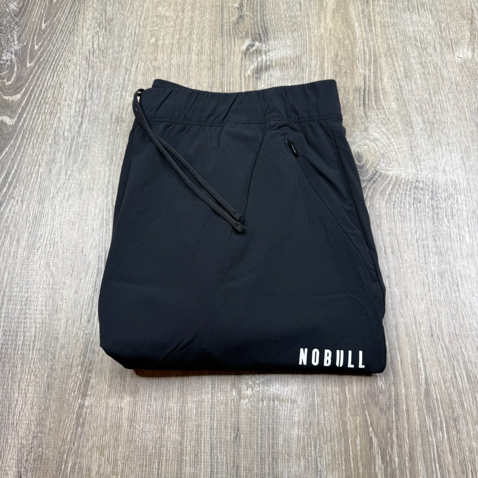 Nobull Mens Black Stretch Ankle Zip Outdoor Tapered Jogger Pants Size XL