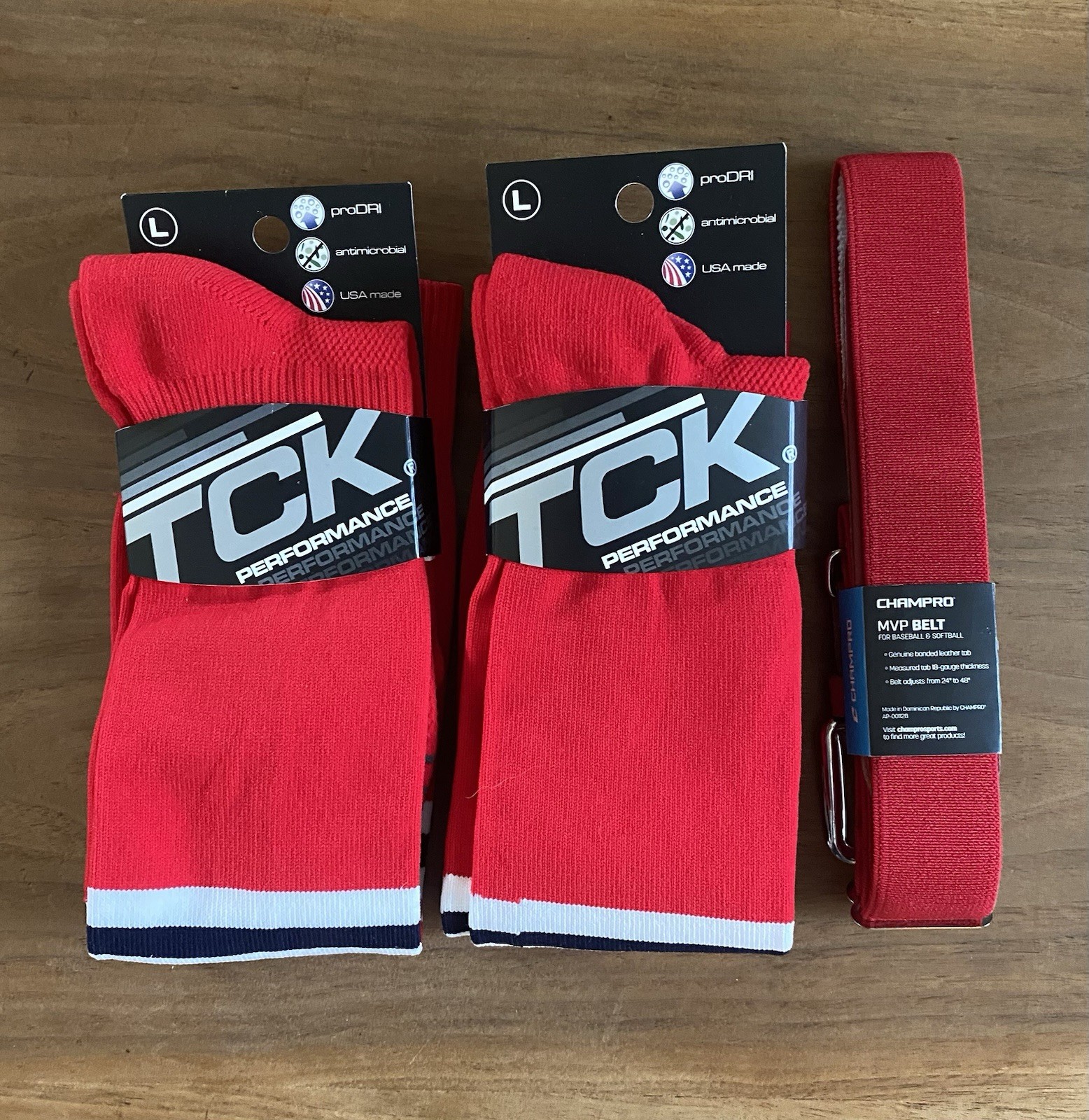 2 PAIRS OF RED TCK PERF. BASEBALL SOCKS (LARGE) + RED CHAMPRO MVP BELT (ADULT)