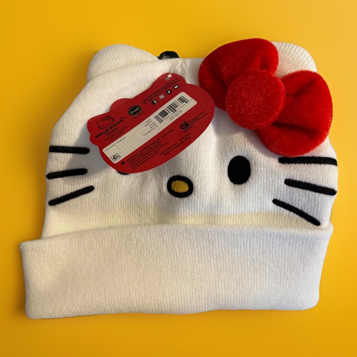 New White Sanrio Hello Kitty Knit Cuffed Beanie Hat with a Cute Red Bow & Ears