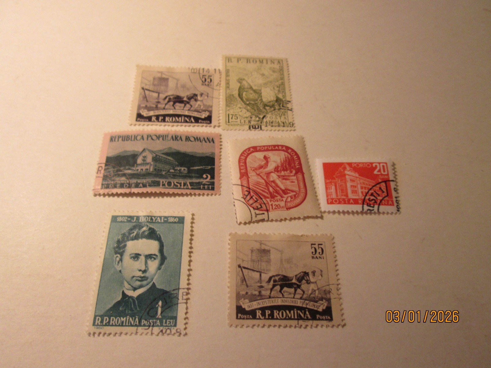 AN ASSORTMENT OF SEVEN [7] WORLDWIDE STAMPS. USED
