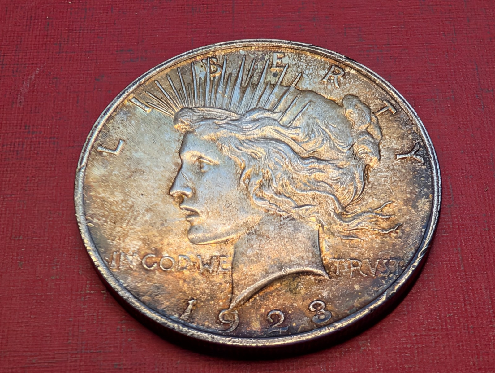 1923P Toned Peace Silver Dollar XF+ 260437