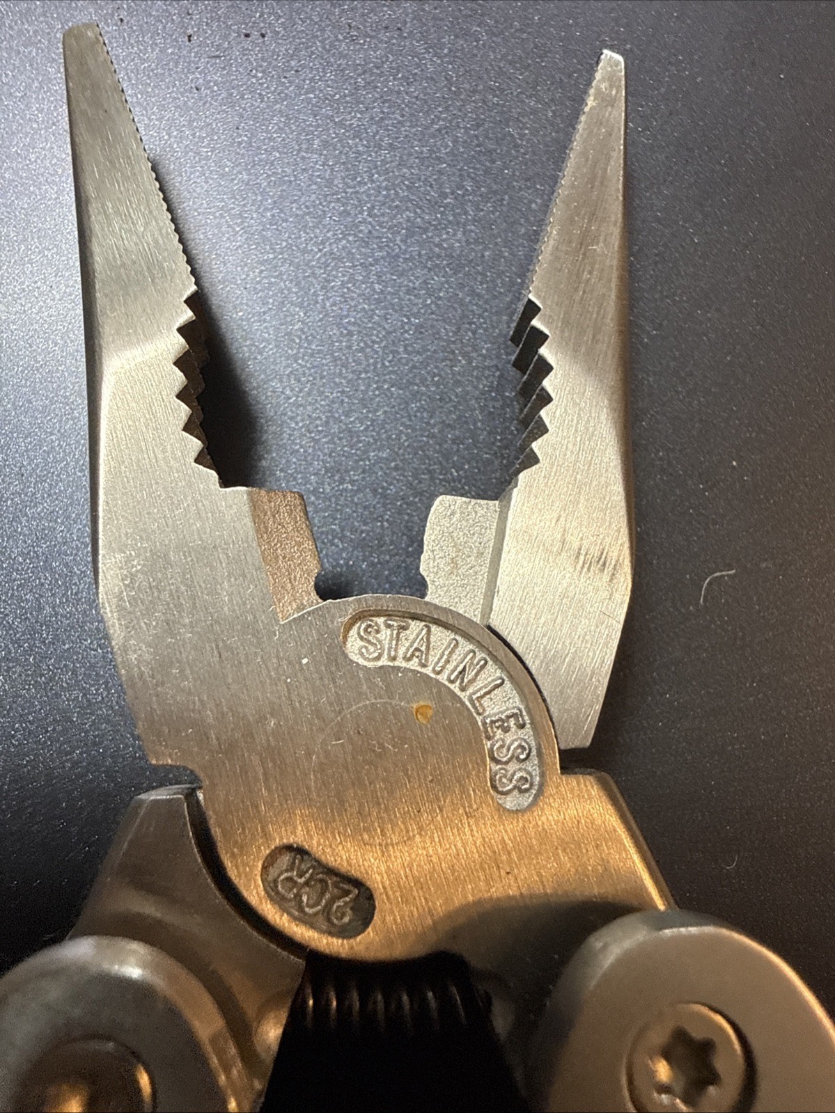 Winchester #2CR Wood Grain Multi-Tool Pliers Saw Screwdriver Can Opener And More