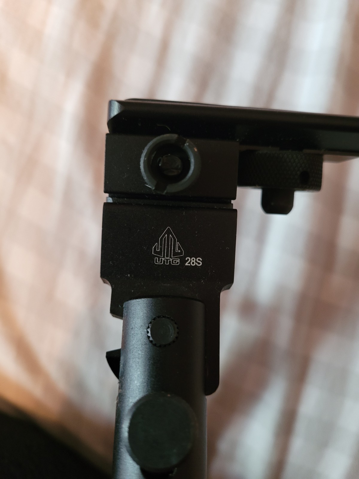UTG 28S Rifle bipod, compact with folding legs.