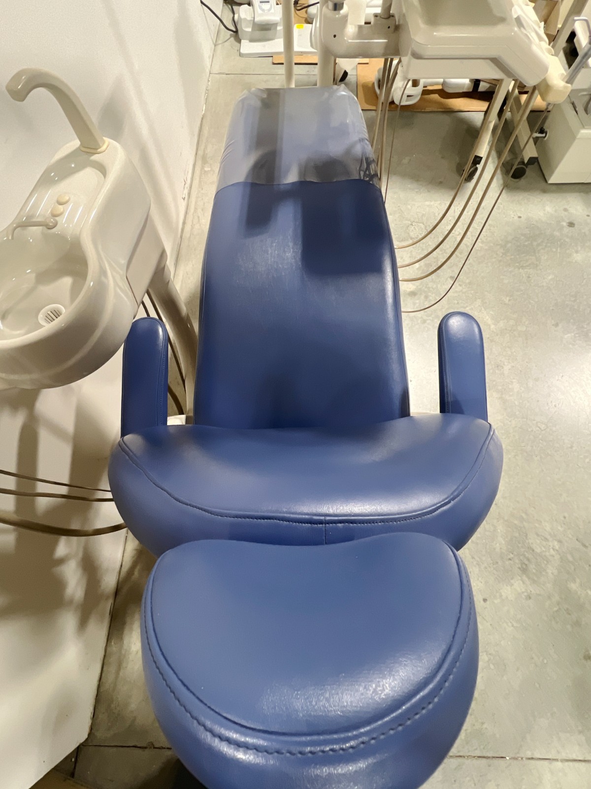 ADEC 1021 Dental Chair, Radius Delivery Unit, Cuspidor, Assistant’s Pkg & Light