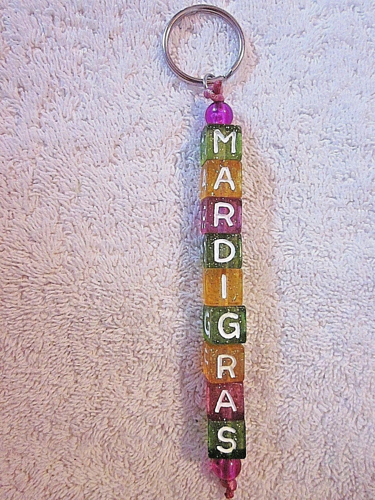 SHARP "MARDI GRAS SPELLED" PURPLE-GREEN-YELLOW ACRYLIC COLORED KEYCHAIN (B63)