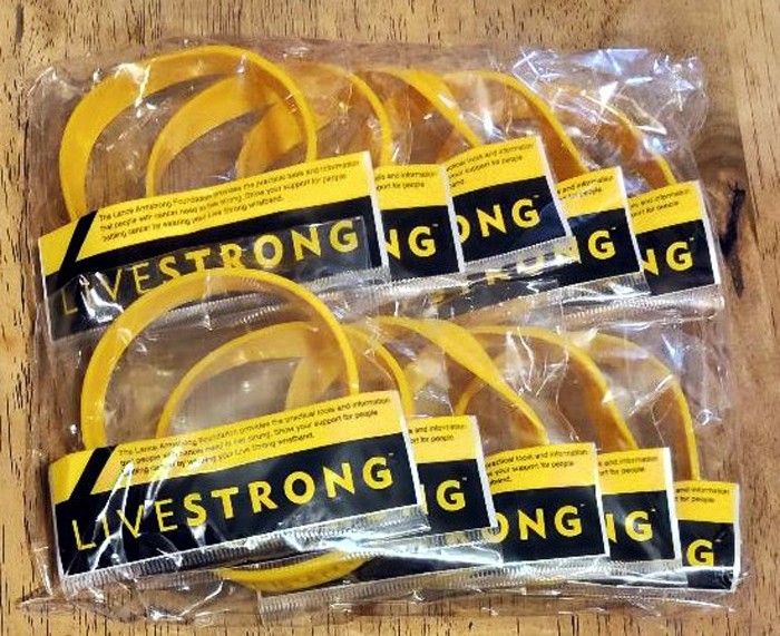 Package of 10 NEW NIKE LIVESTRONG Lance Armstrong Foundation Wrist Bands SEALED