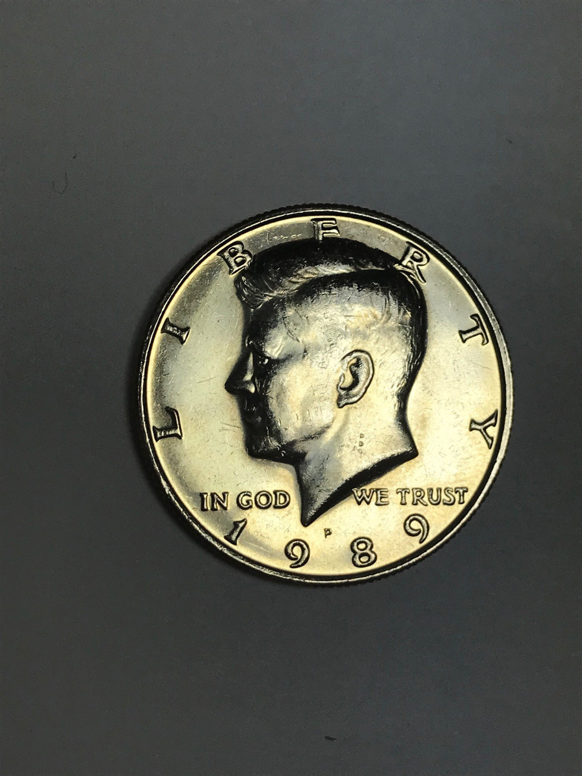 1989-P Kennedy Clad Almost Uncirculated Half Dollar