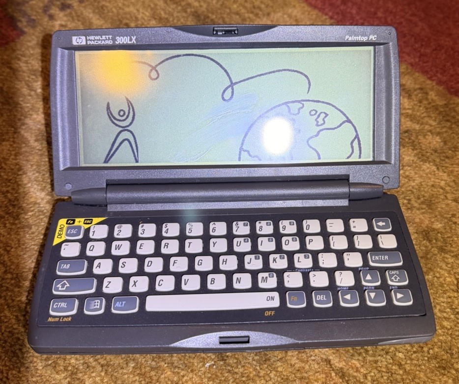 WORKS Vintage HP 300LX Handheld Graphic Display PC Palmtop 2MB