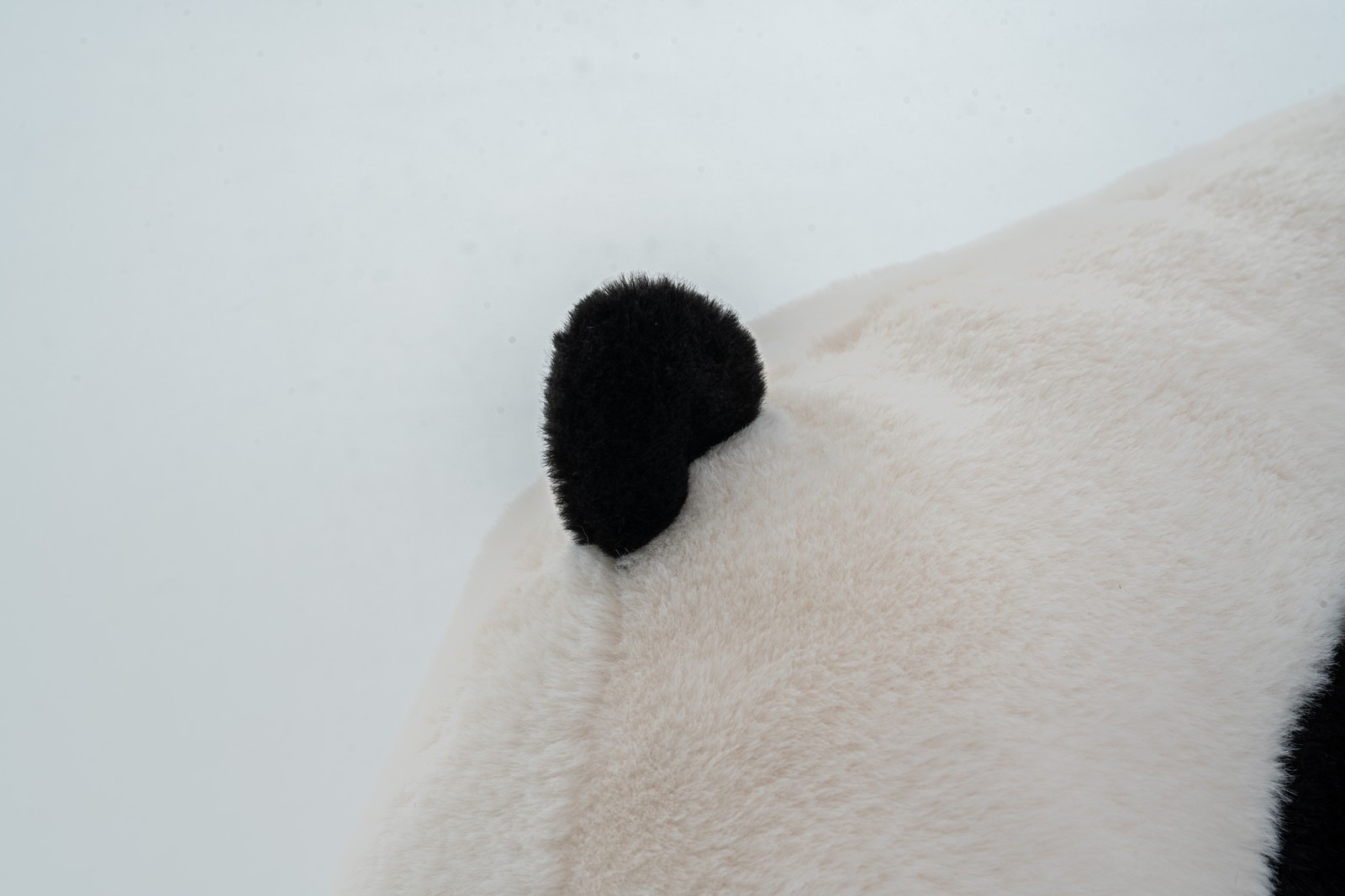 Panda-shaped beanbag chair, crafted from soft plush fabric, suitable for bedroo