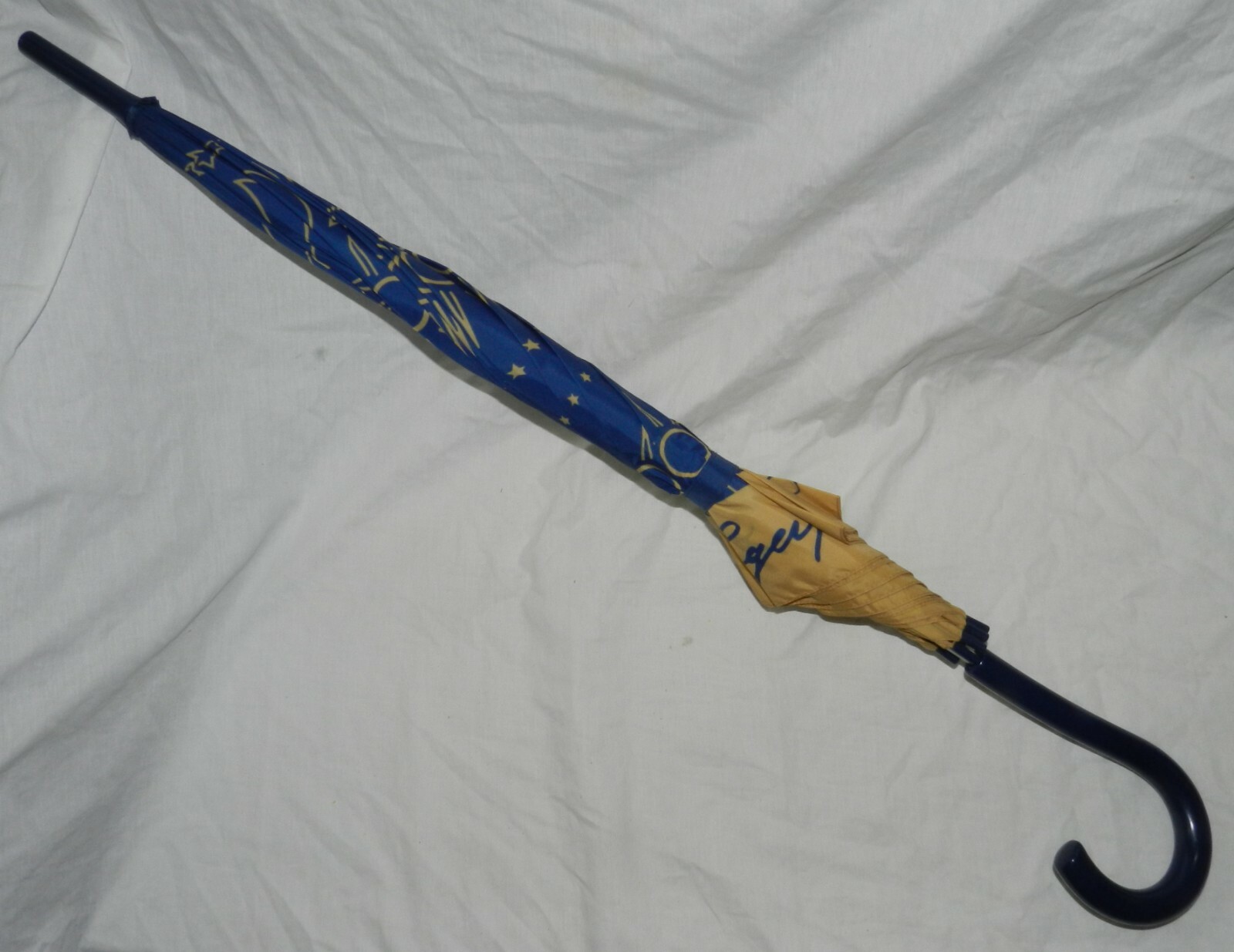 Blue and Beige Umbrella advertising Ken Lagerfeld Sun Moon Stars Perfume