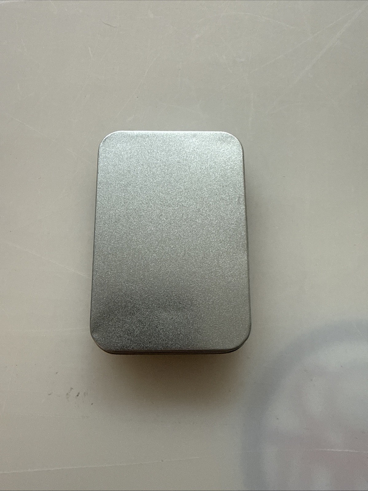 Solid metal construction with metal carrying & display case. Multicolor finish