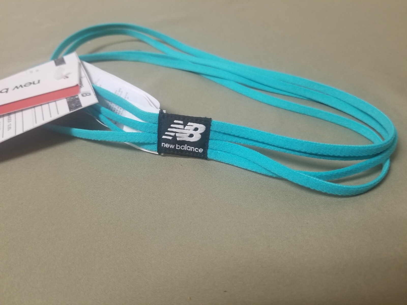 New Balance Strappy Sample Stretch Headband.