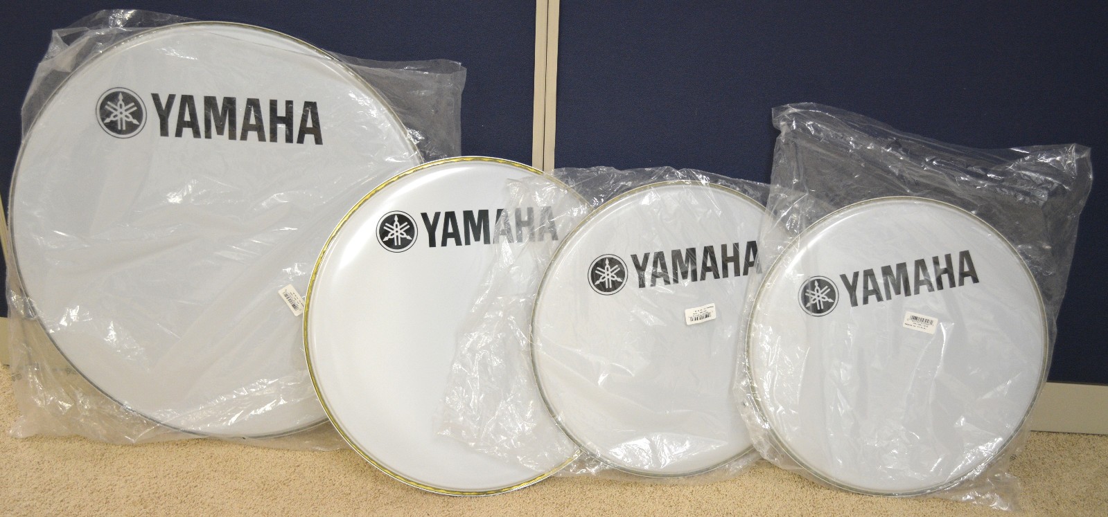 LOT/4 YAMAHA SMOOTH WHITE MARCHING BASS DRUM HEADS WITH LOGO - 18", 20", 26"