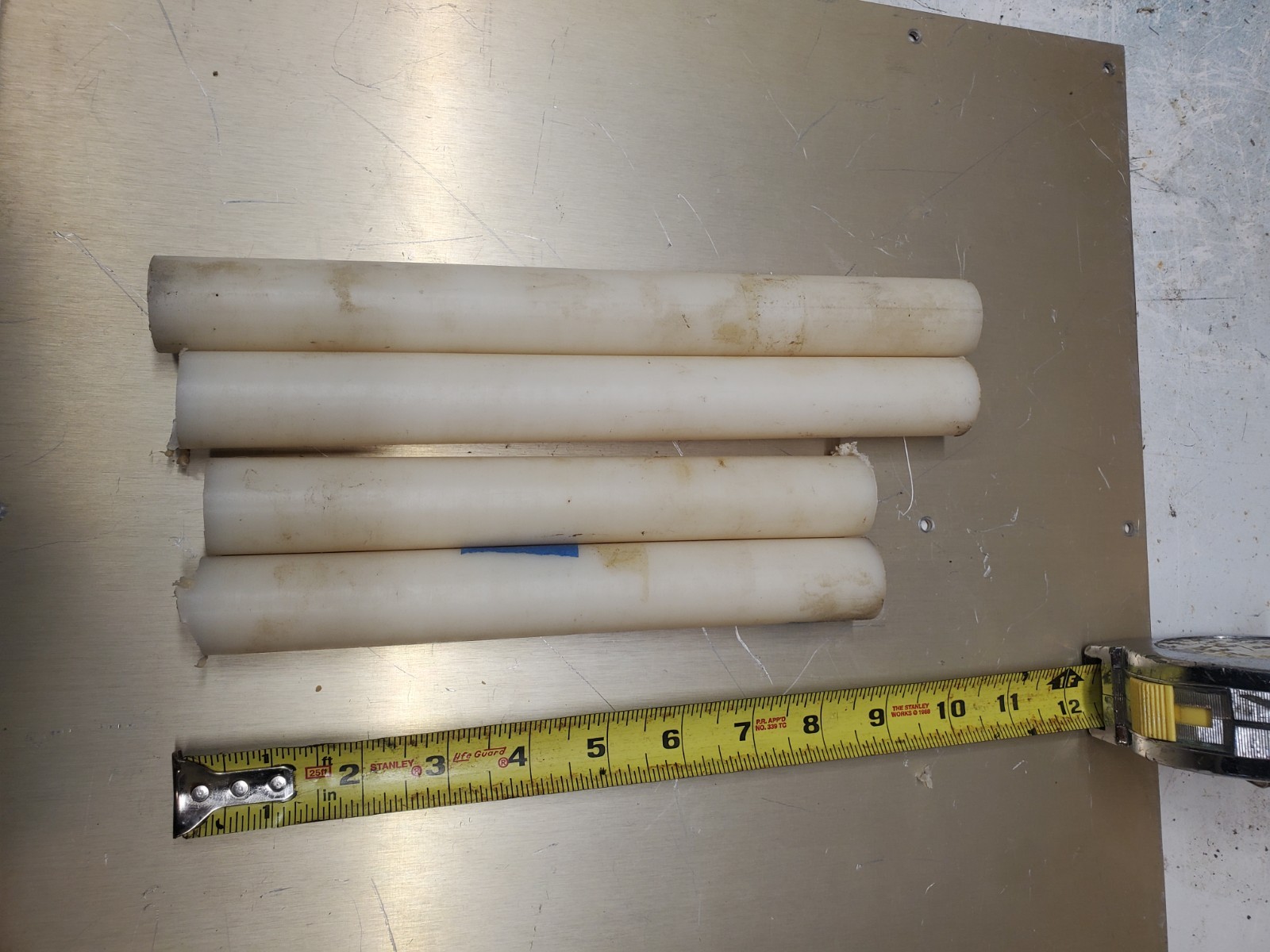 Delrin Cut Offs Various Lengths 1.125in Dia. 4 Pieces.
