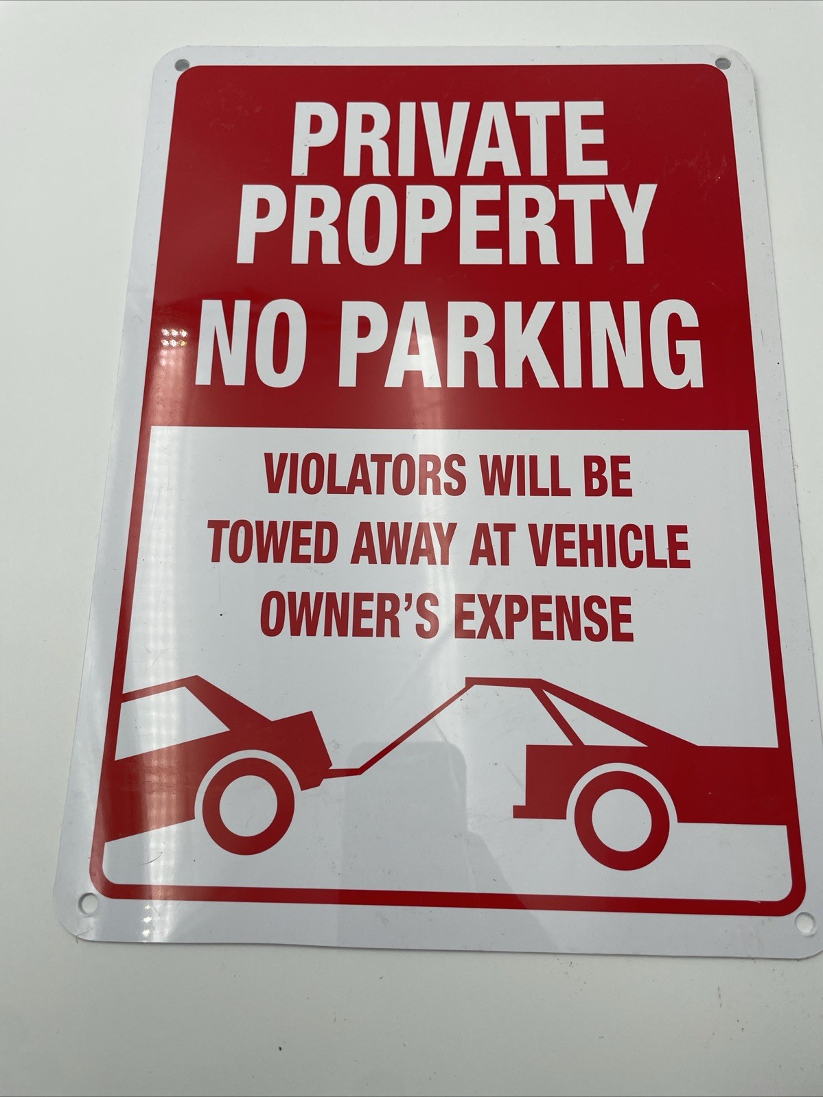 Private Property No Parking Violators will be towed away at owners expense sign