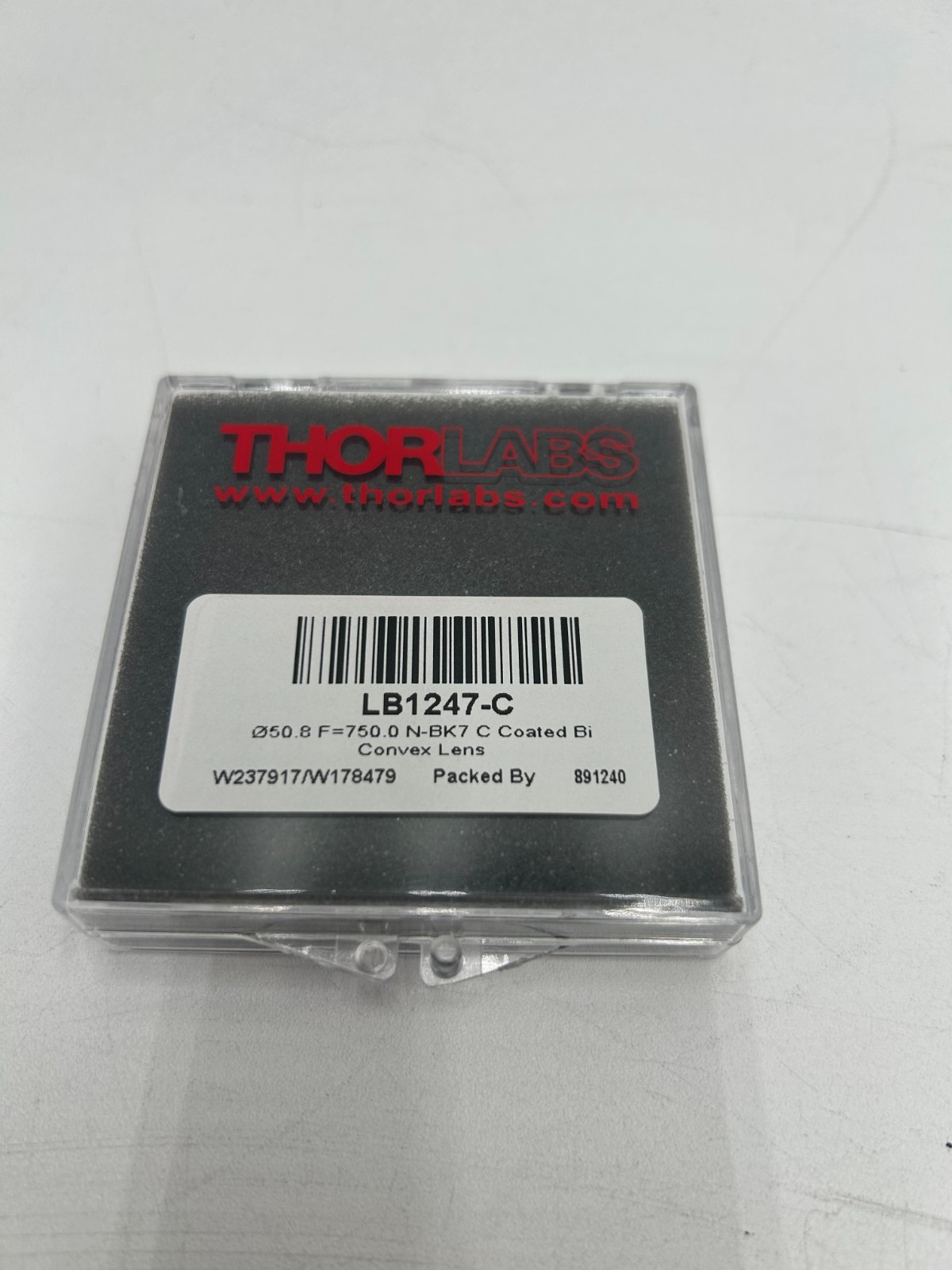 THORLABS LB1247-C N-BK7 Bi-Convex Lens, Ø2", f = 750.0 mm, ARC: 1050 - 1700 nm
