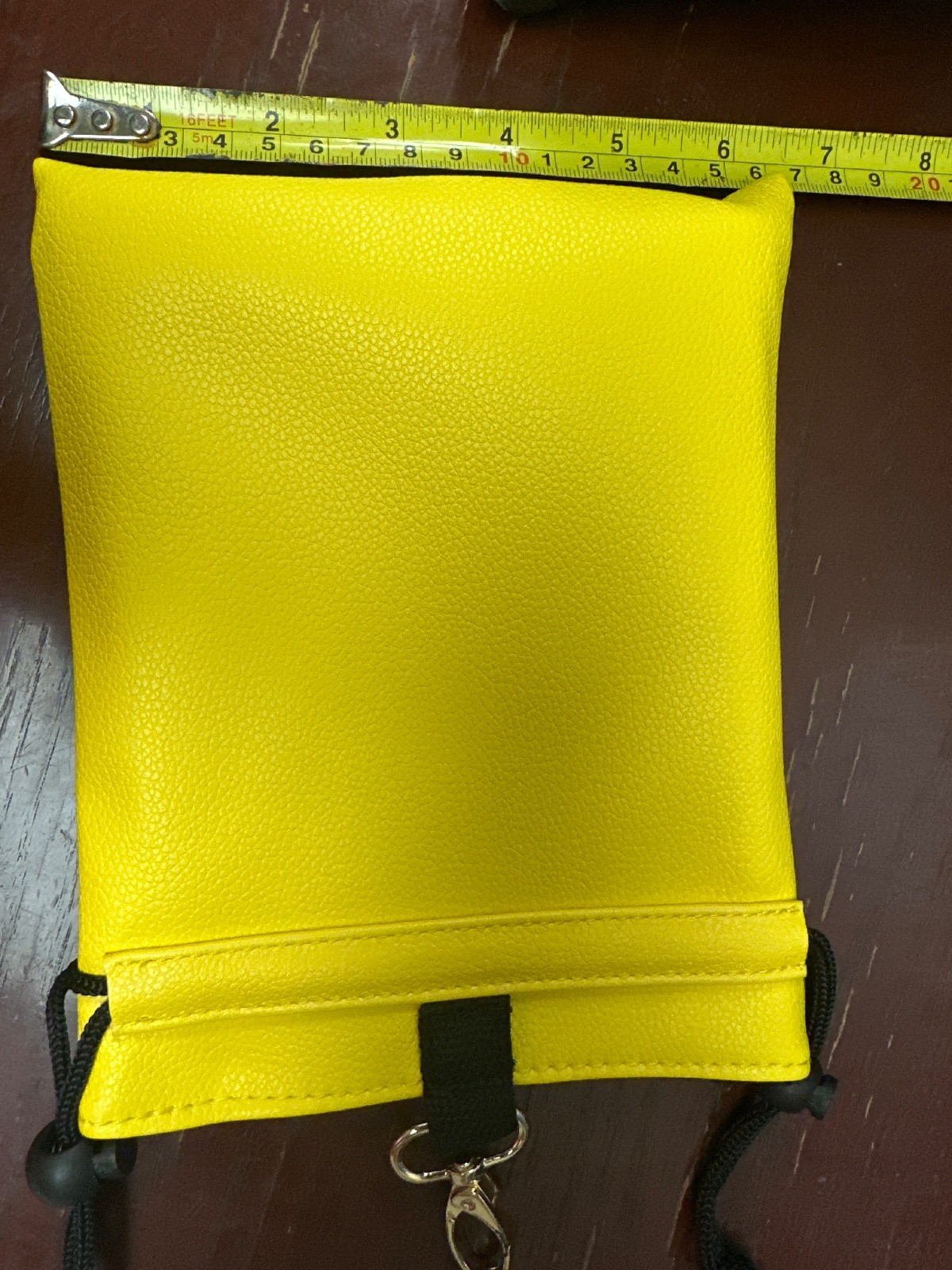 Crown yellow texture golf accessory pouch, drawstring close with attaching clip.
