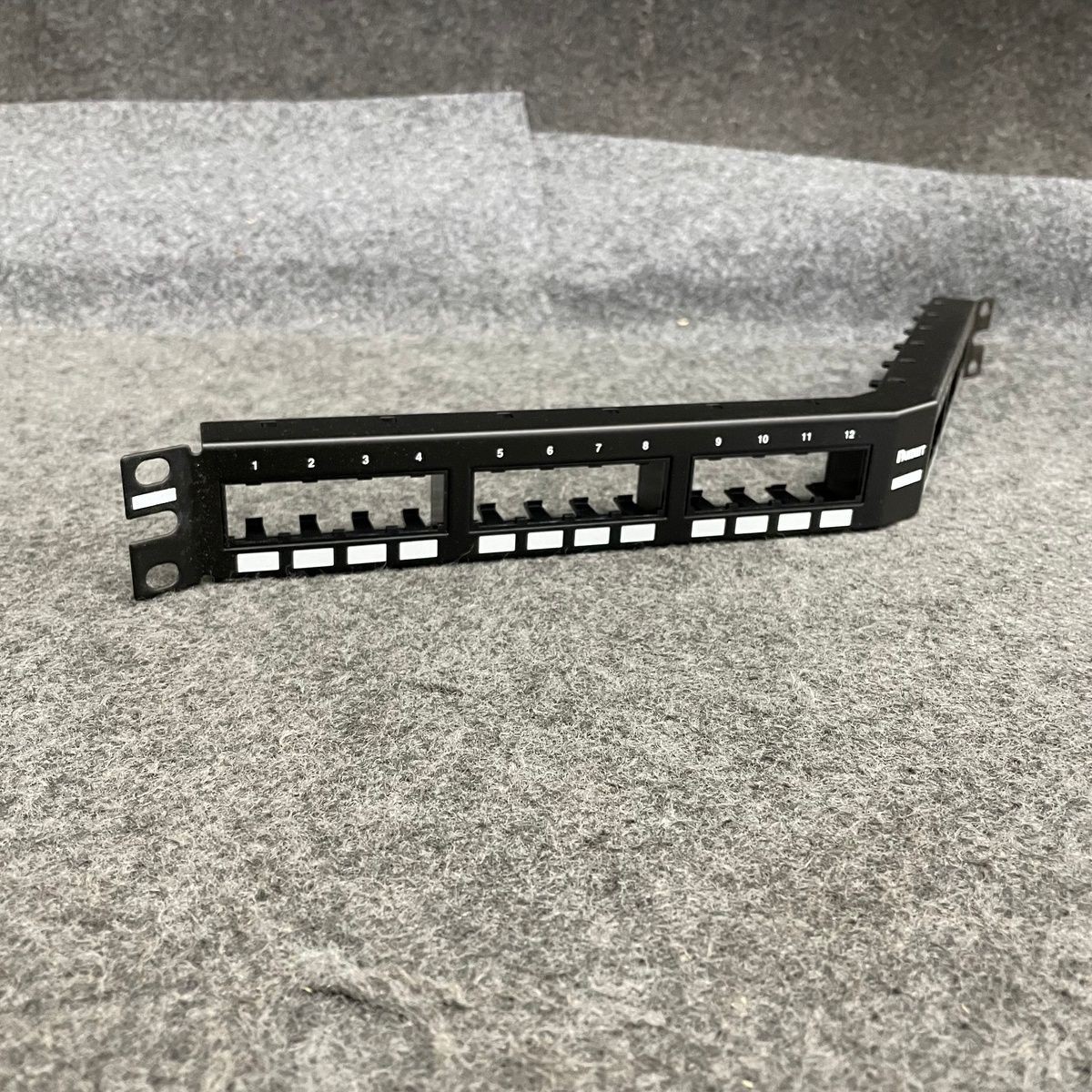 PANDUIT Pan-Net 24-Port Flat Angled Flush-Mount Patch Panel Cover CPPA24FMWBLY
