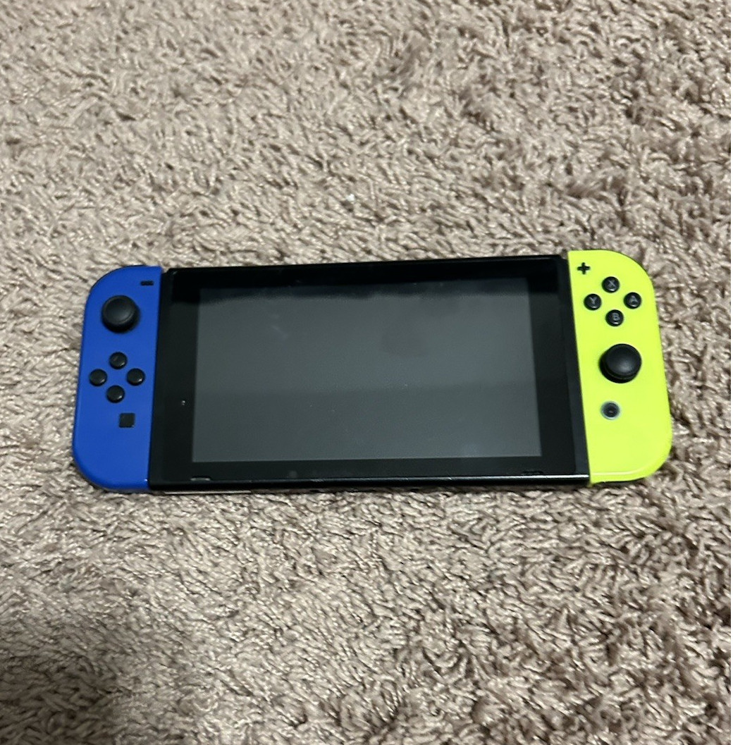 Nintendo Switch Bundle w/ Dock, Case, Controller, and joycon controller