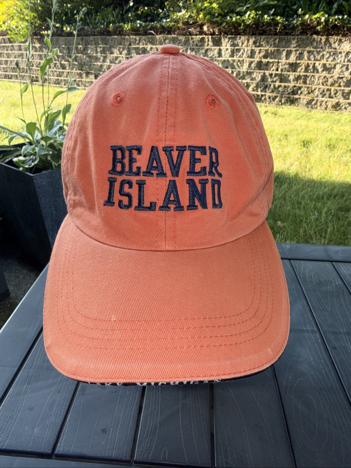 Beaver Island in Navy Letters on Burnt Orange Hat Cap. Strap Buckle Cotton