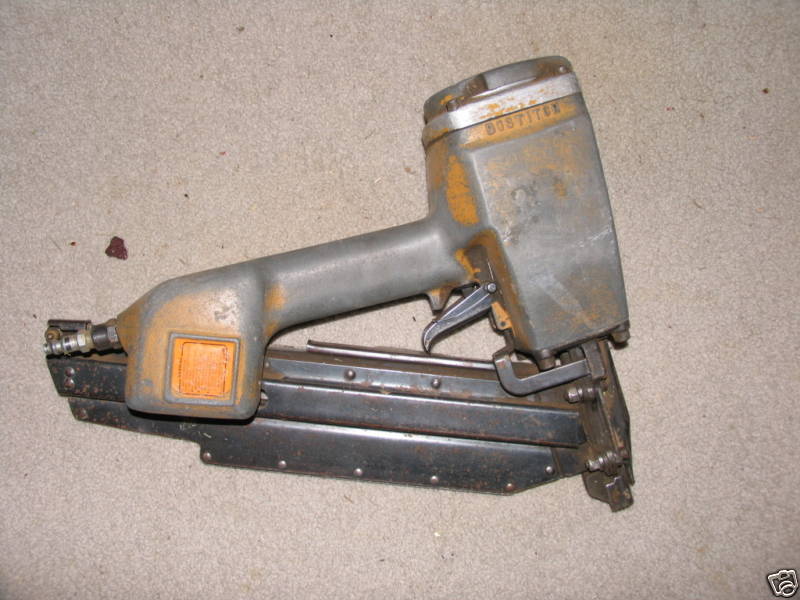 Used Bostitch  stick nailer air gun