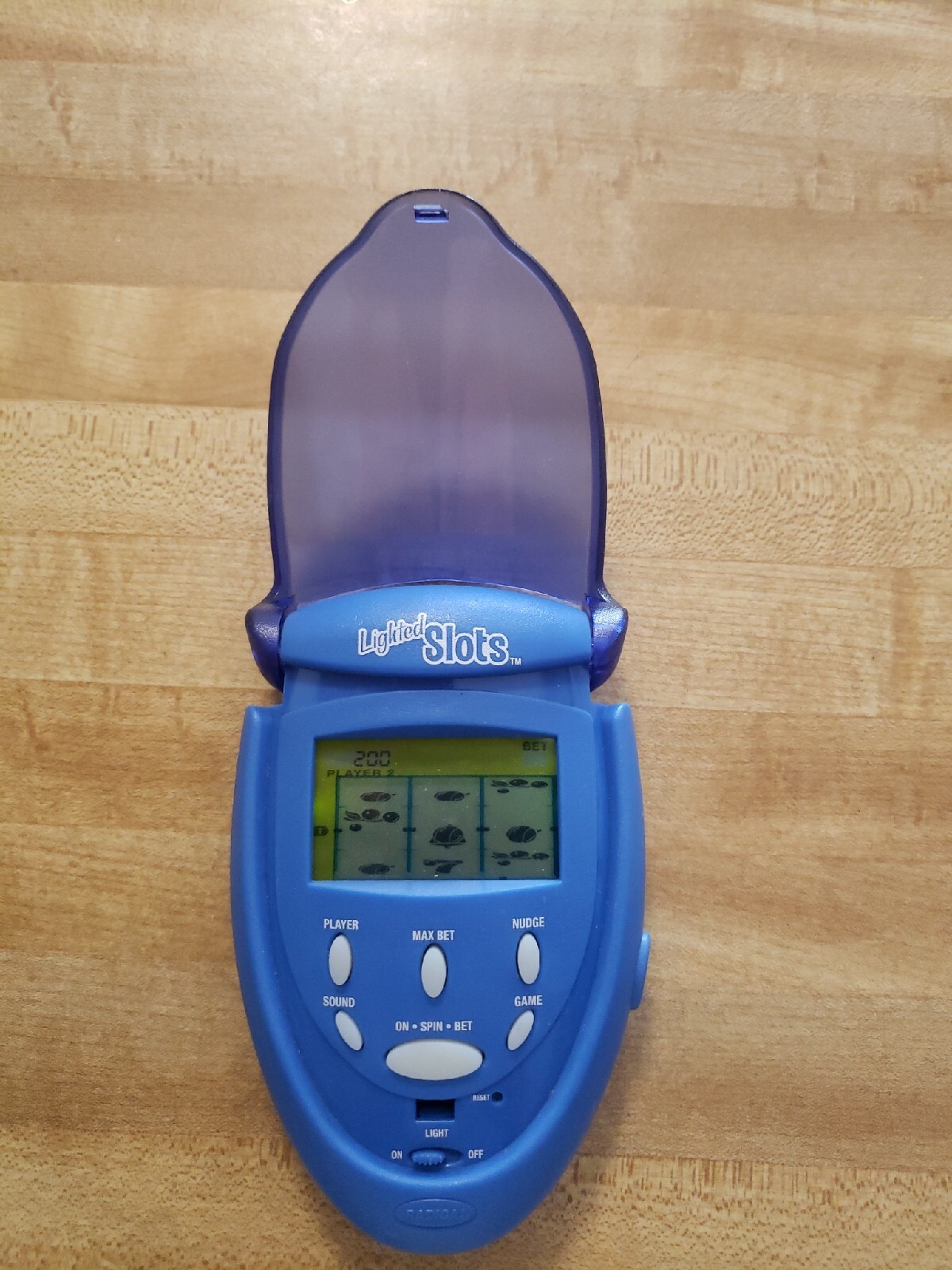 Radica Lighted Slots Electronic Handheld Game 2003