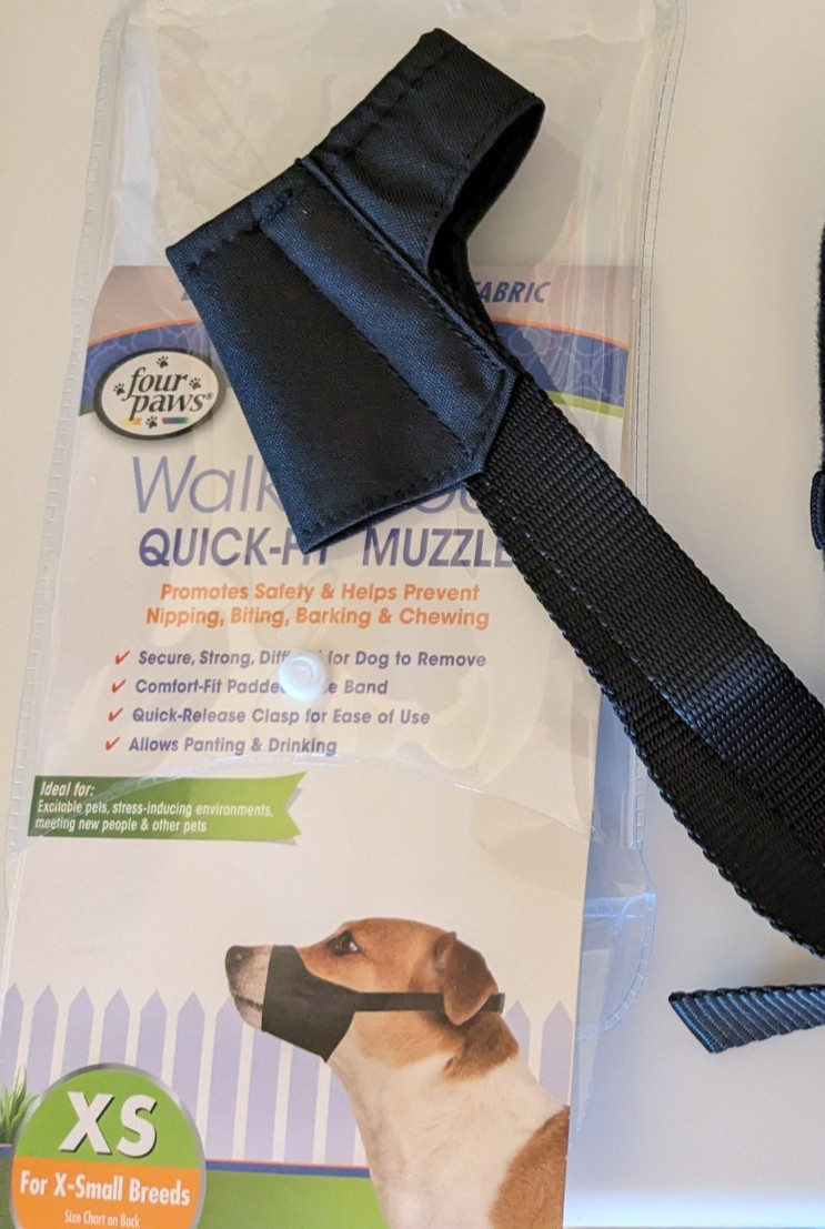 XS Four Paws DOG Quick fit Muzzle New in package.  Never used for small breeds