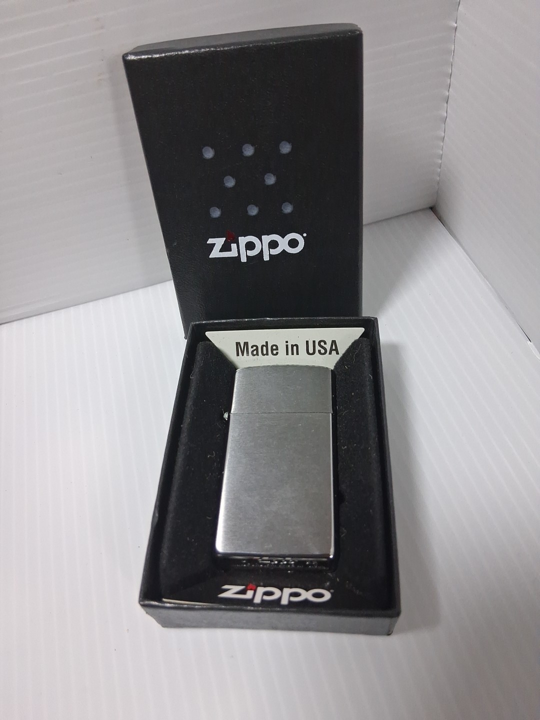 zippo brushed silver tone lighter in box marking j 22