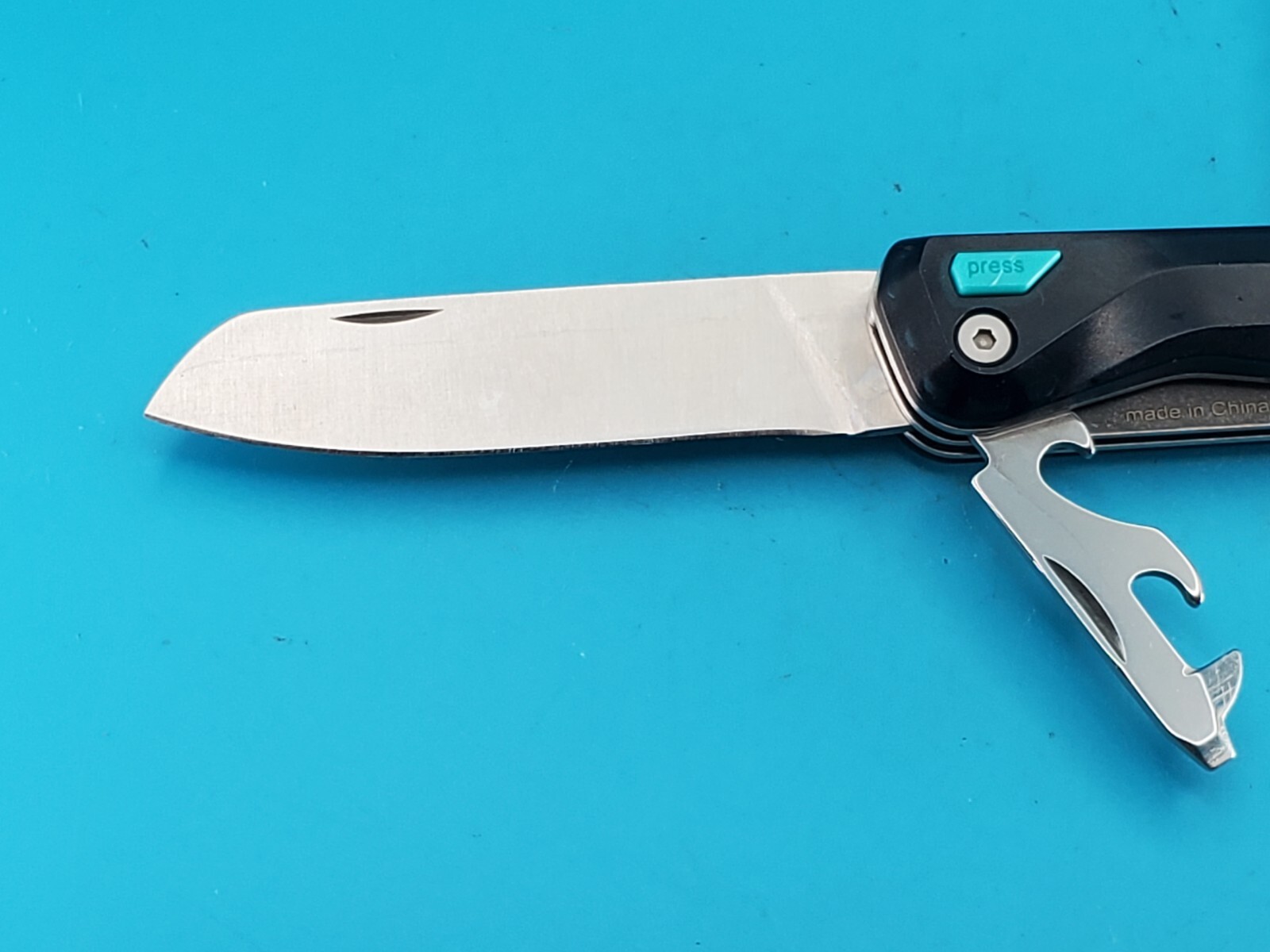 QUECHUA CLAP FOLDING KNIFE NAVAJA MULTITOOL! TRANSLUCENT BLUE!