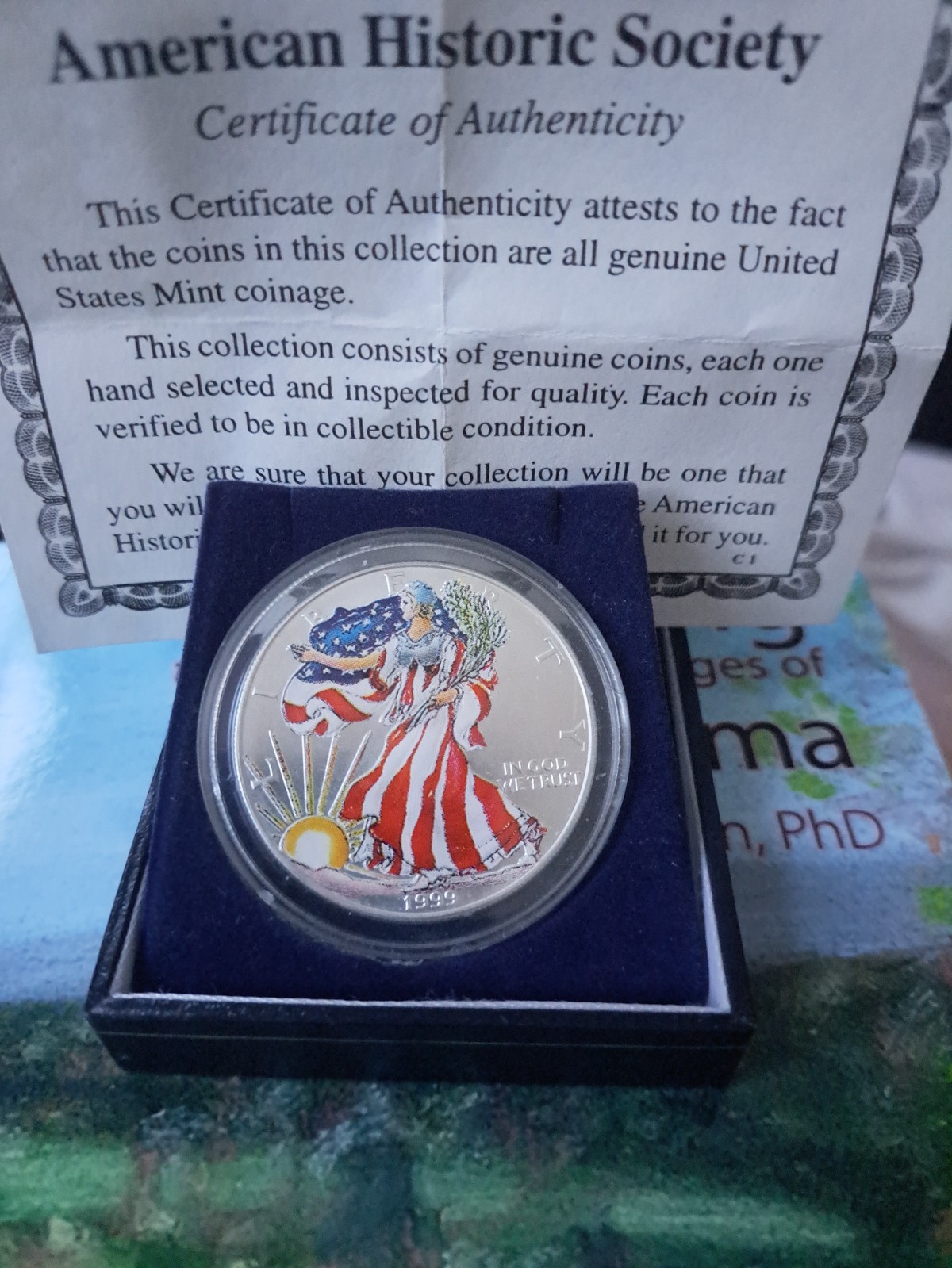 A colorized mint liberty 1999 one dollar coin