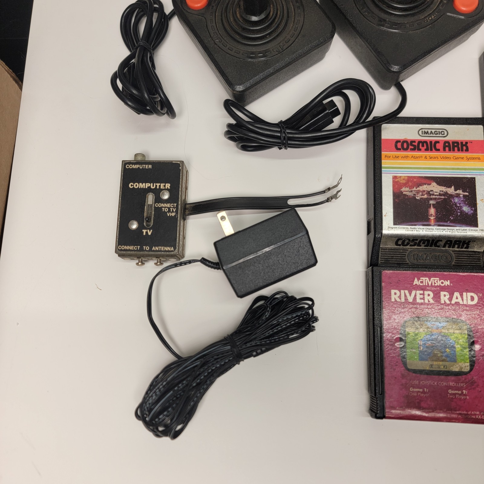 Atari 2600 Console * Controllers * Games ** Large Lot ** Untested