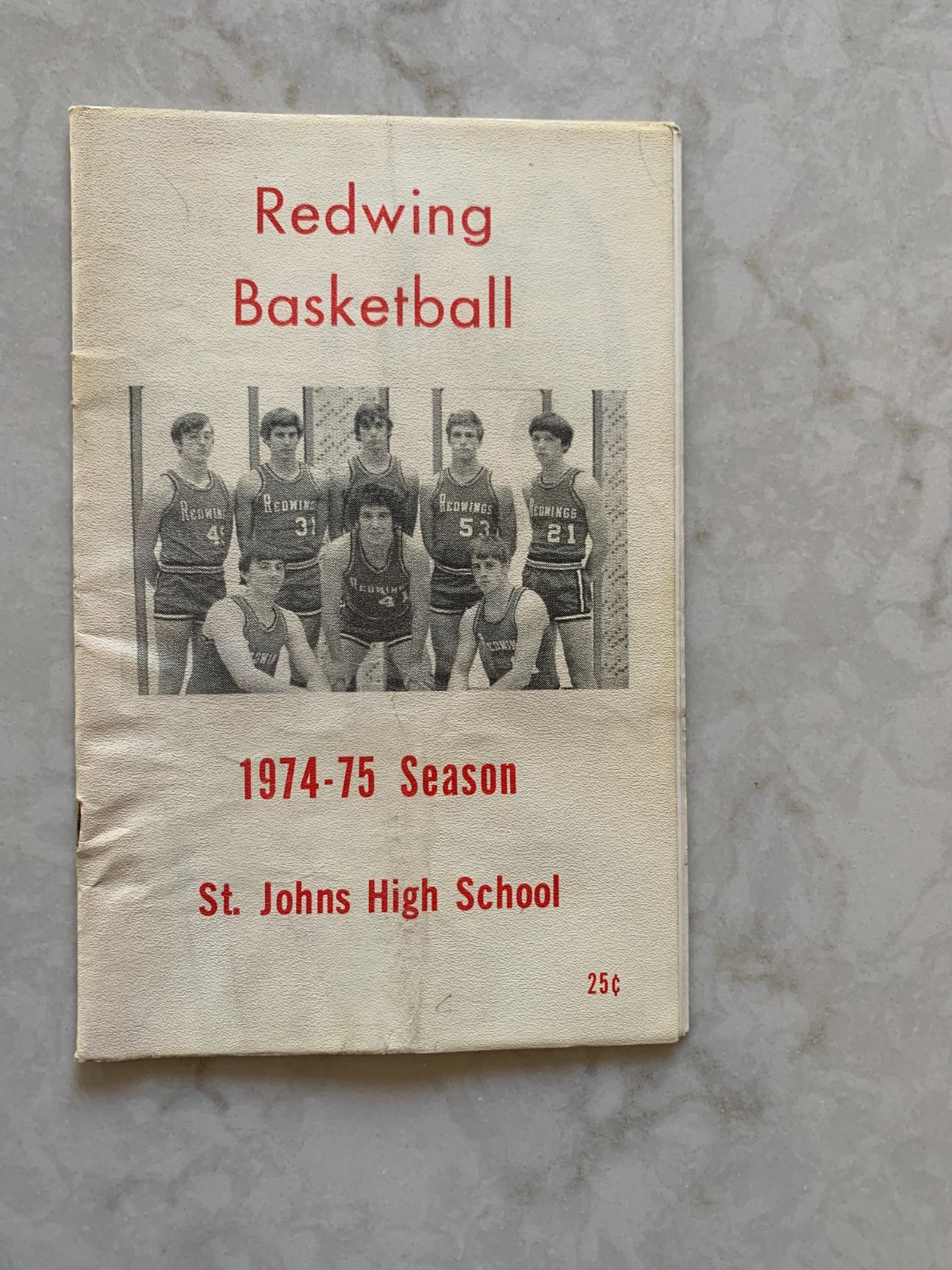 St. Johns (MI) High School, Redwing basketball game program, 1974-75 season