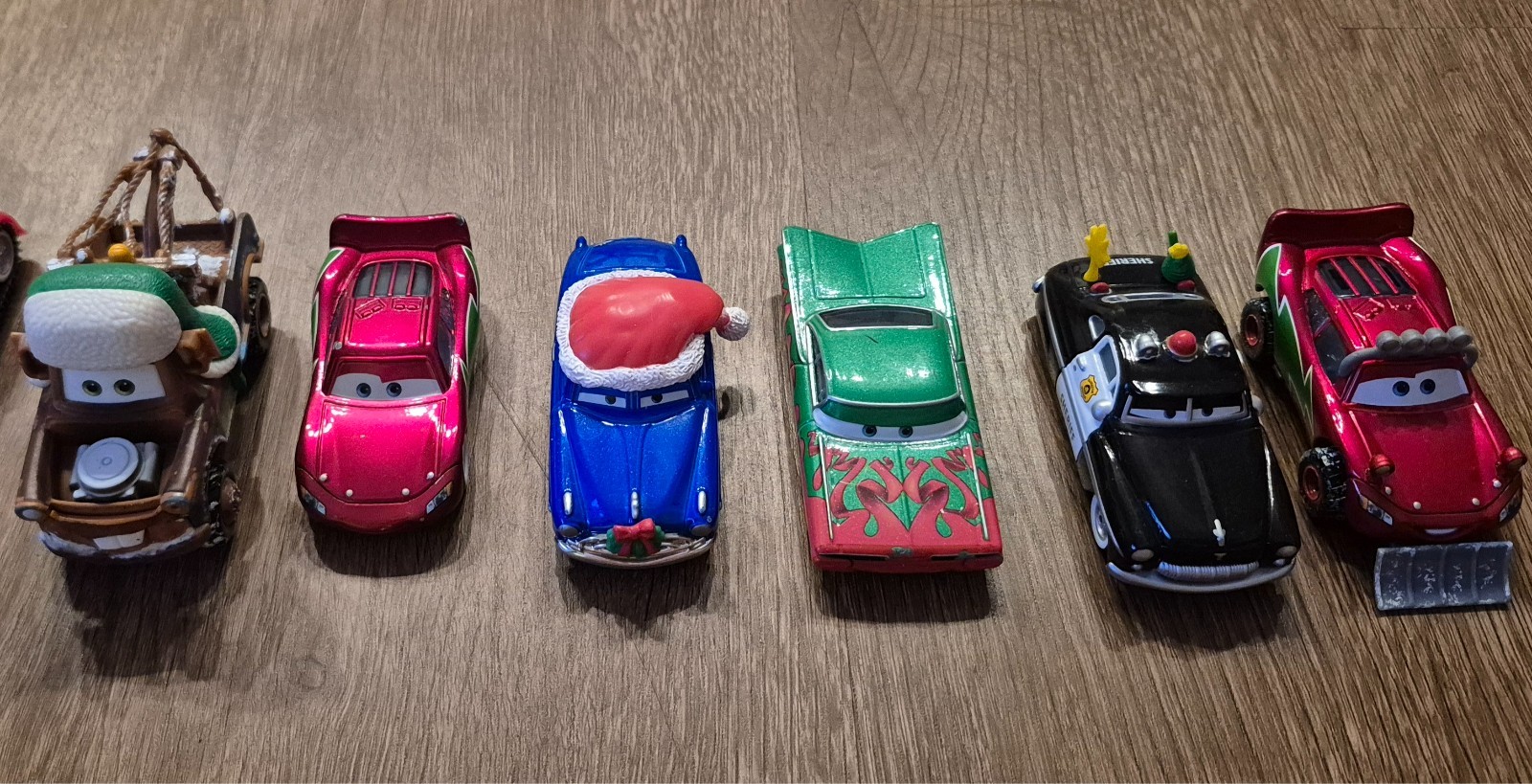 LOT OF 6 RARE DISNEY CARS DIECAST CHRISTMAS  CARS WITH WEEHOO MATER