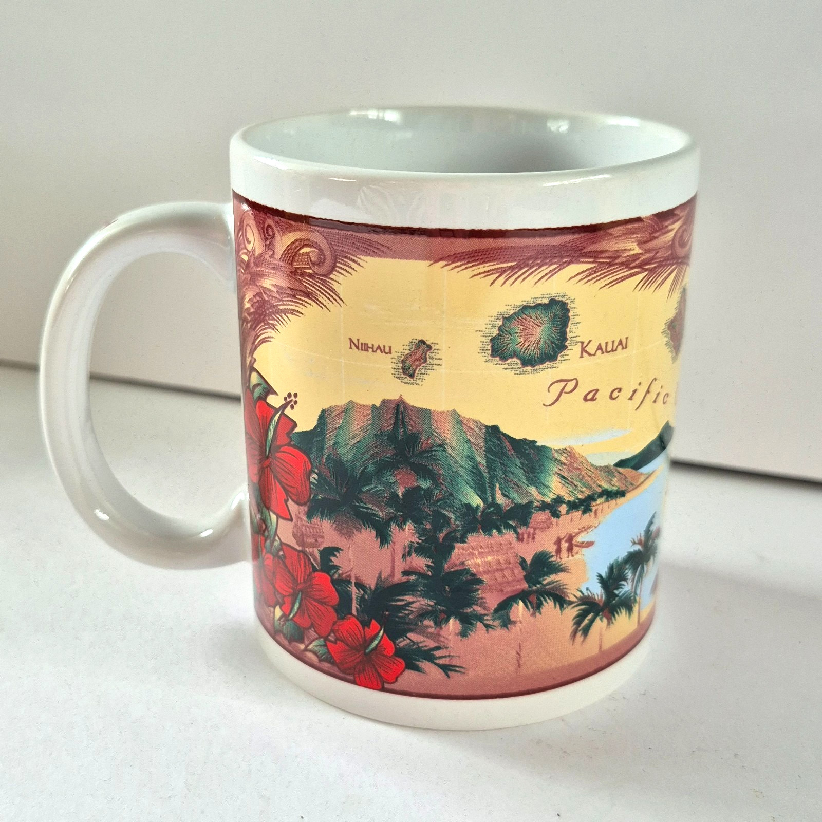 HAWAIIAN ISLAND CHAIN ON COFFEE MUG IN BROWN NEW IN BOX