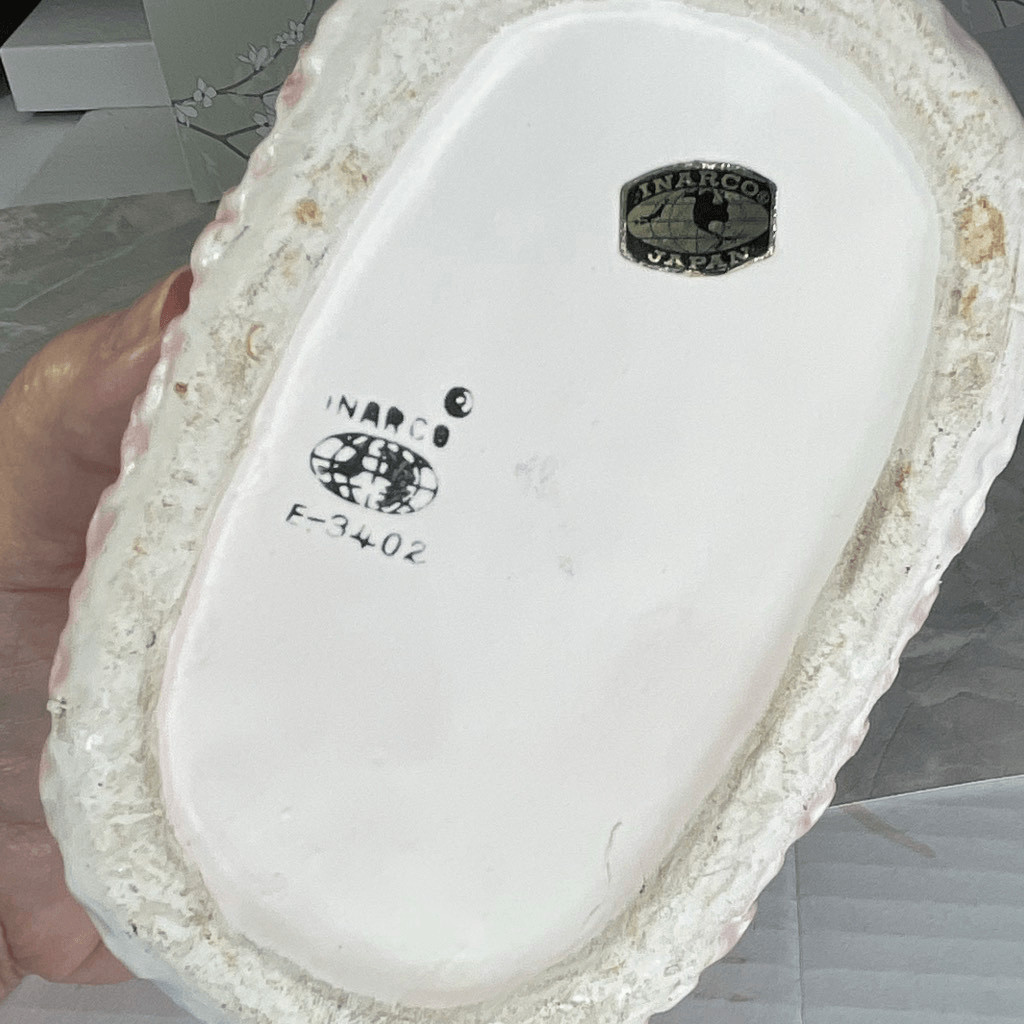 Inarco E- 3502 musical baby bassinet planter.