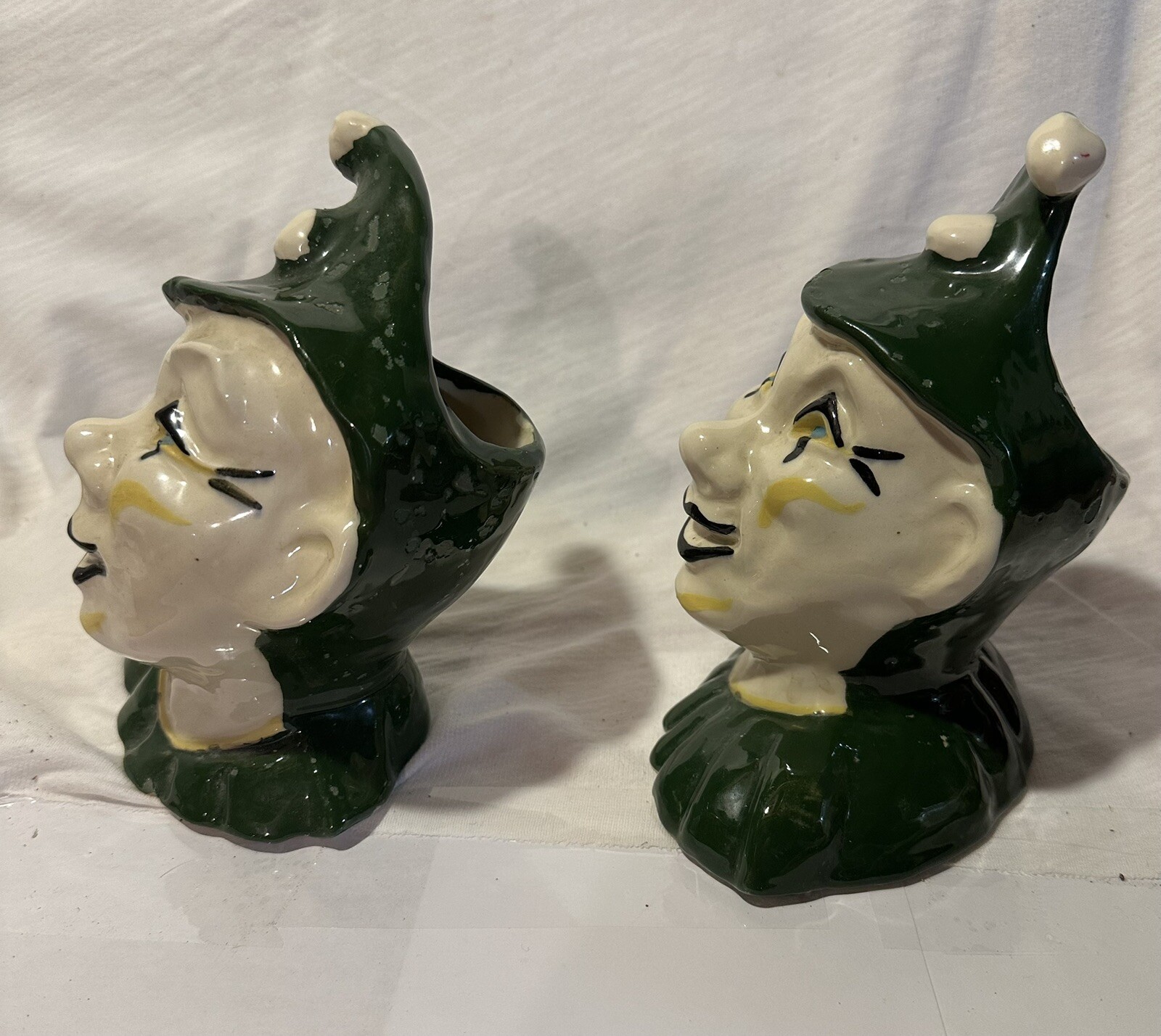 2 ceramic Jester planters.