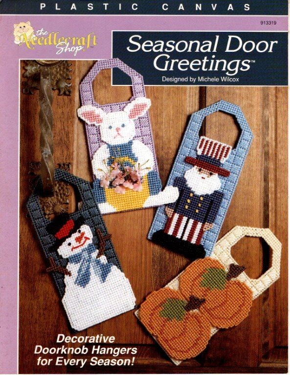 THE NEEDLECRAFT SHOP PLASTIC CANVAS SEASONAL DOOR GREETINGS 4 DESIGNS