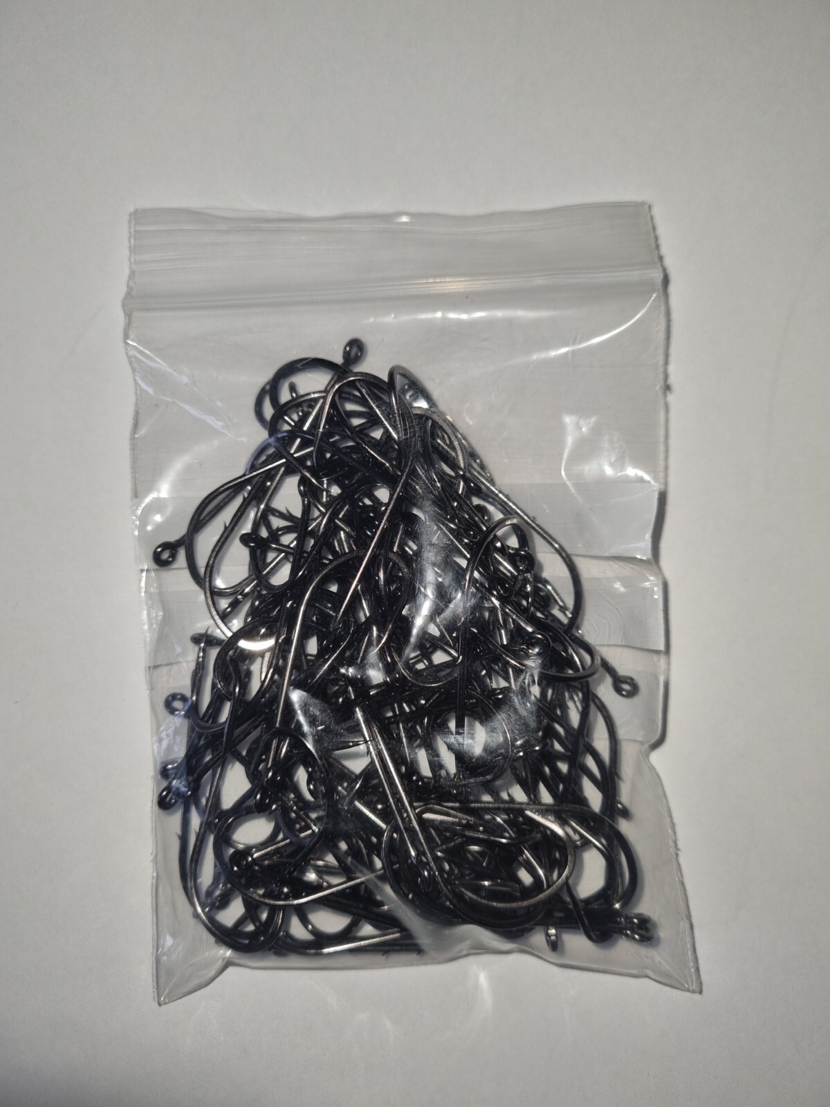 Bait holder hooks 4/0 pack of 100 hooks long shank ultra sharp.