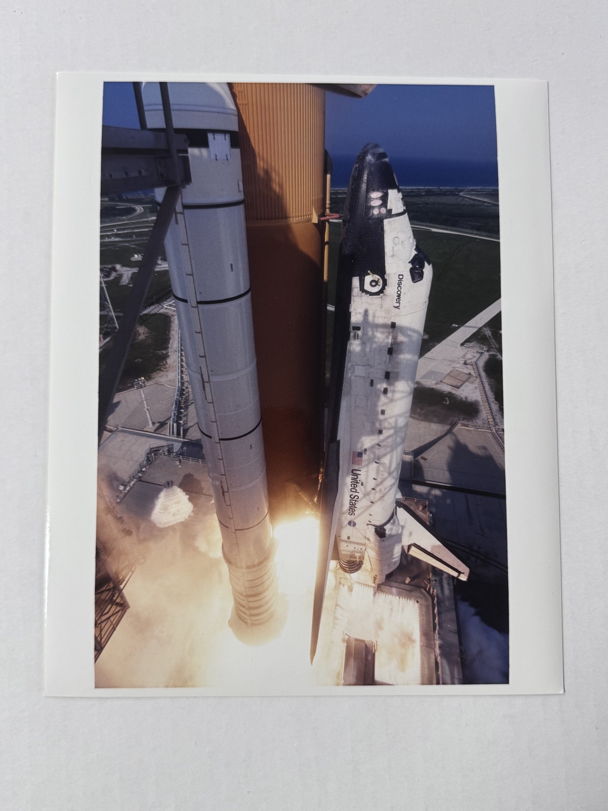 NASA STS-105 Discovery Liftoff with Atlantic Ocean Background Press Photo