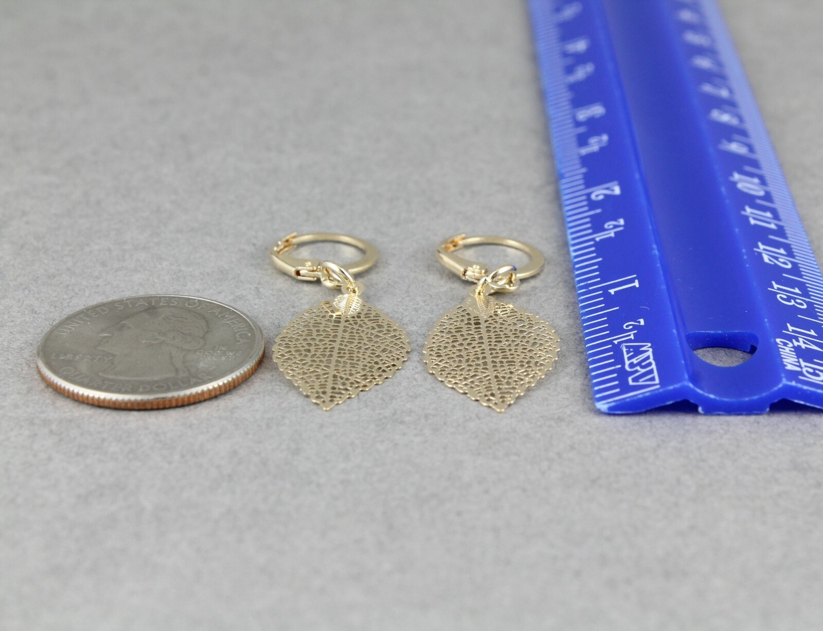 gold leaf earrings small filigree leaves dangle 1.75" long leverback lightweight