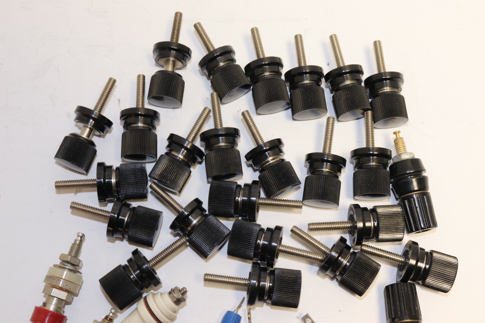 HUGE LOT OF STAND OFF POSTS - MOSTLY EBY (BLACK) - AS PICTURED